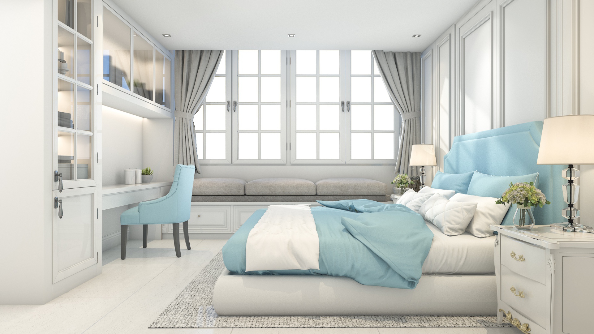 Большая спальня в серых тонах с кроватью и окнами