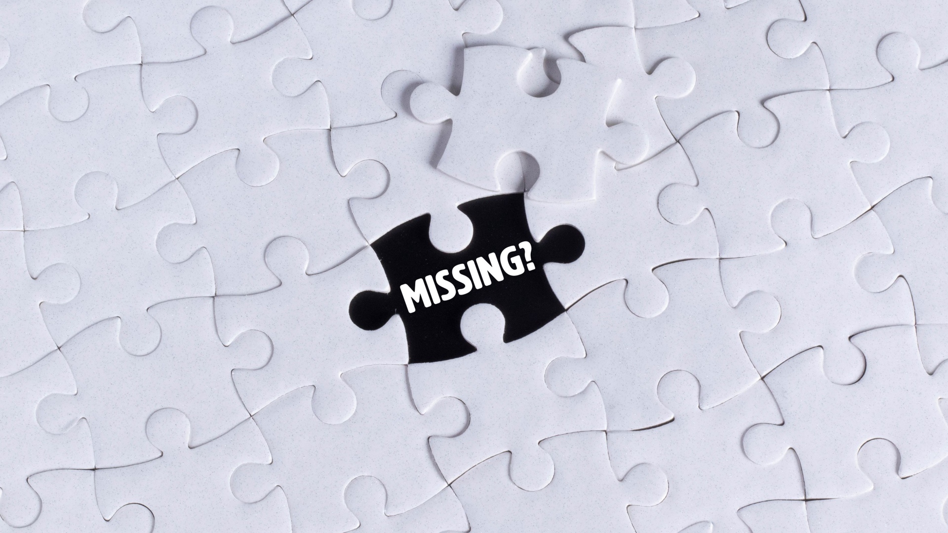 Черный пазл на белой картинке 