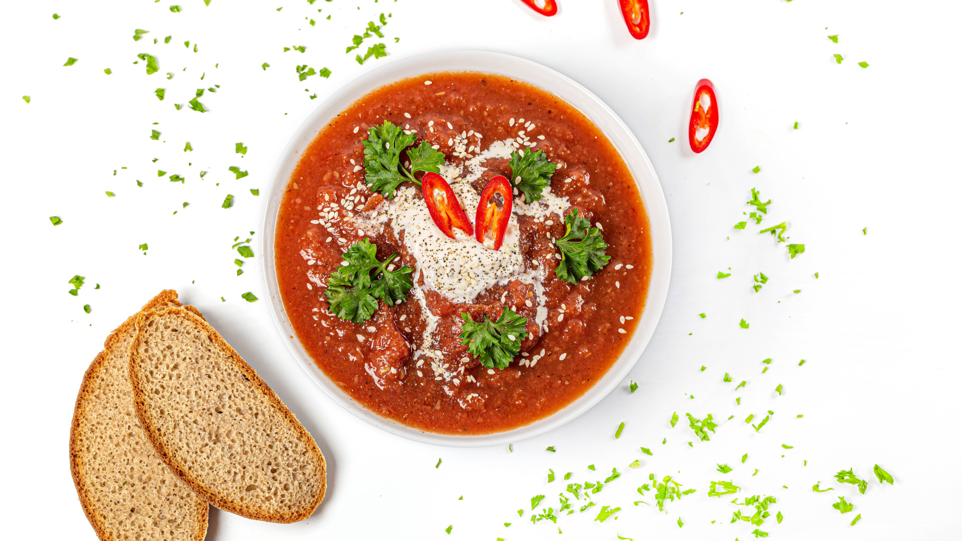 Острая аджика с хлебом на белом фоне