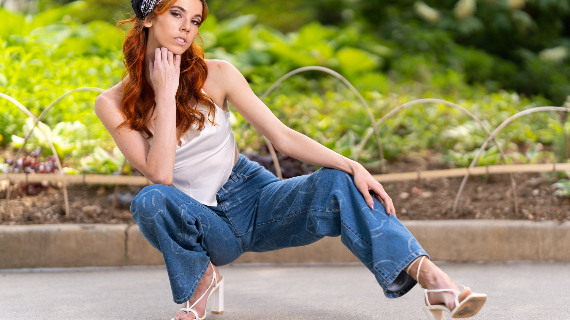 Red-haired girl in blue jeans