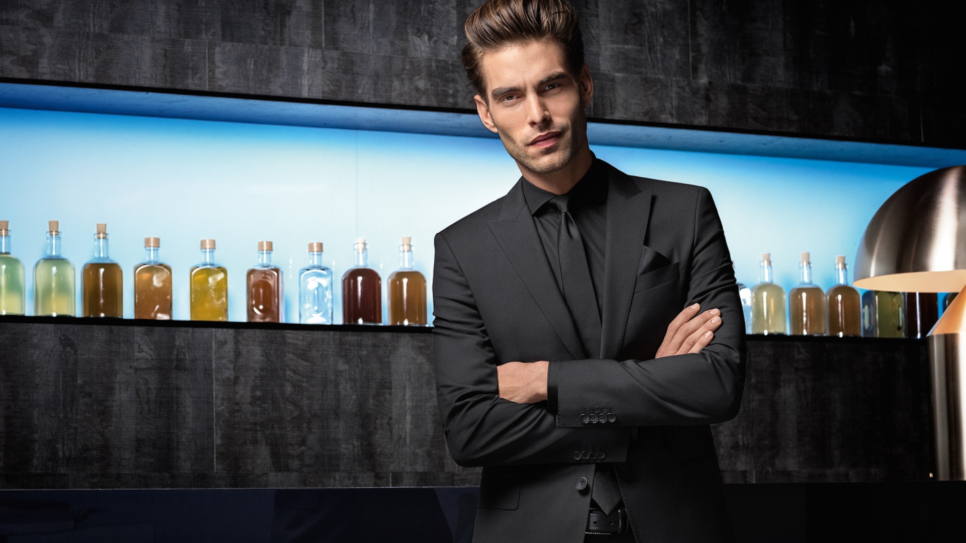 Handsome man in suit at the bar