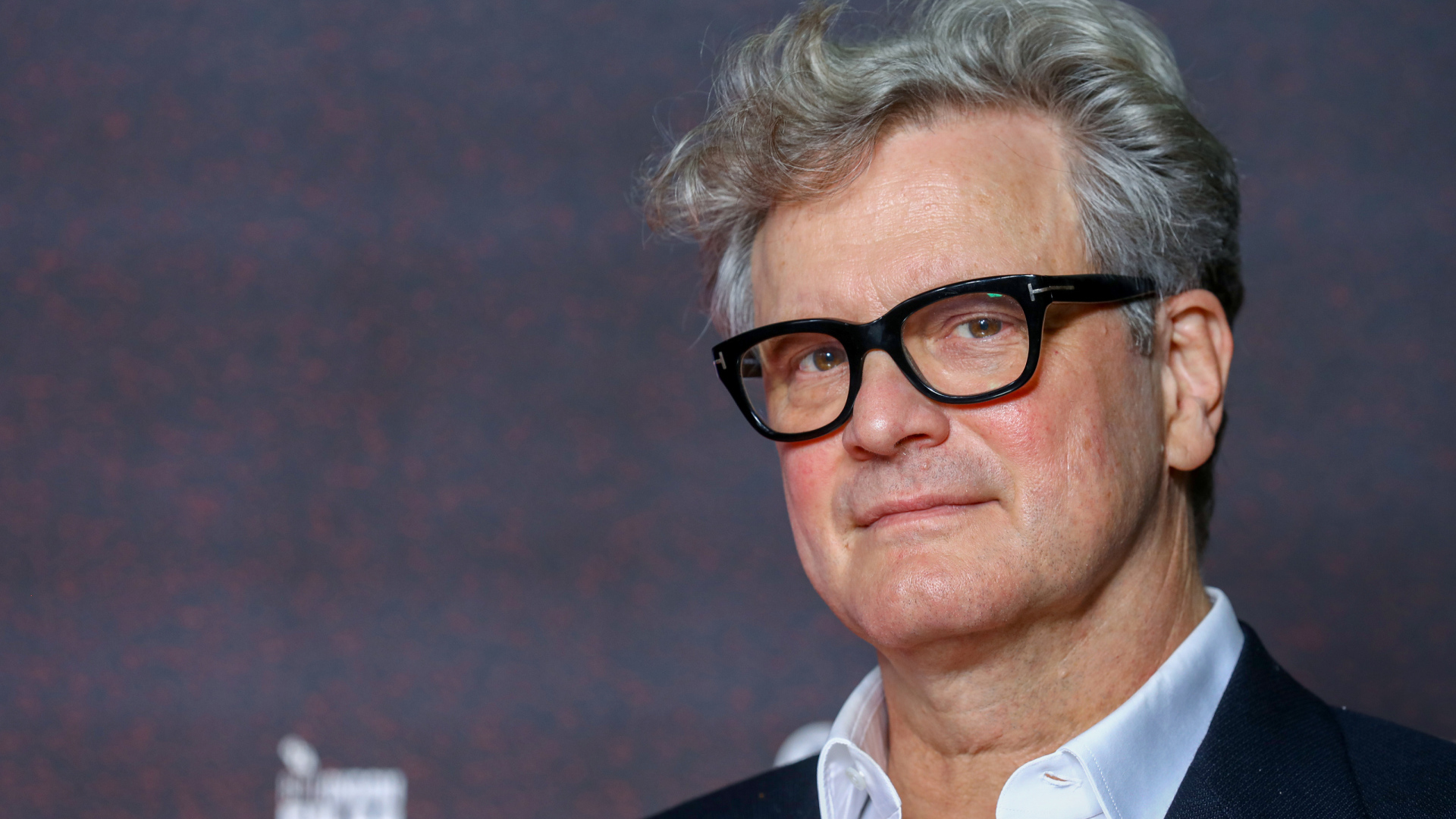 Британский актер Колин Ферт в очках