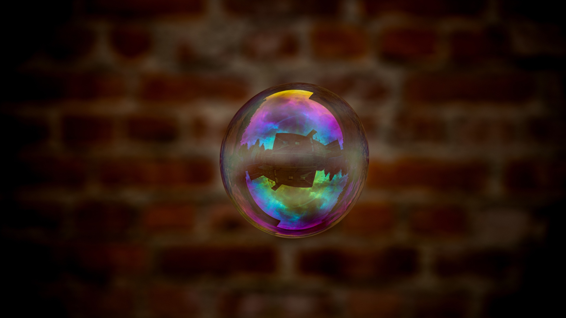 Мыльный пузырь в воздухе на фоне стены