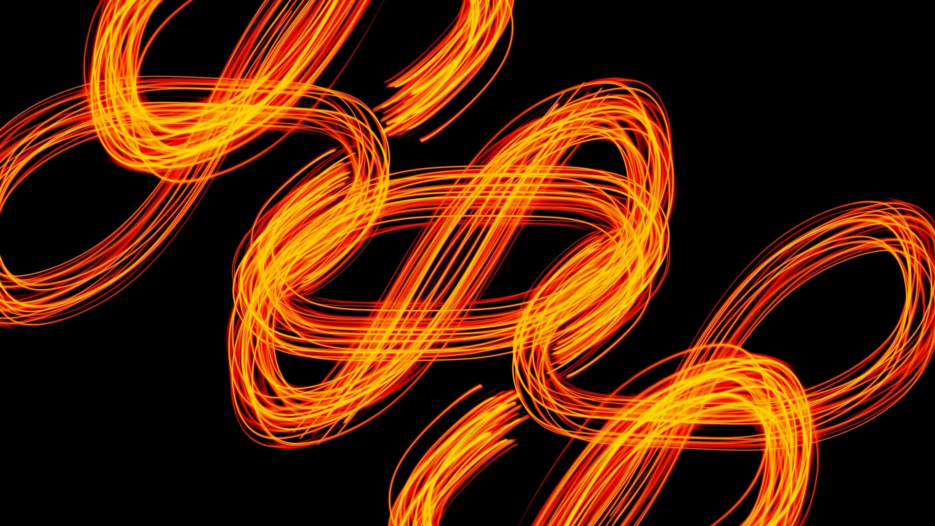 Огненные завитки на черном фоне