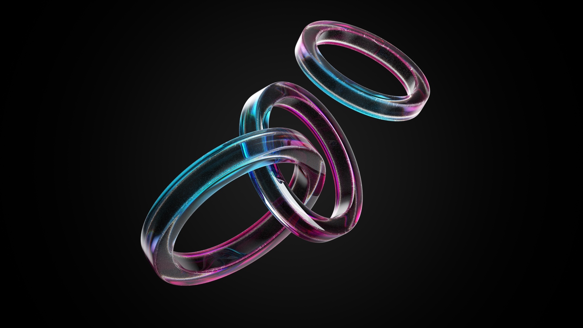 Стеклянные 3д кольца на черном фоне