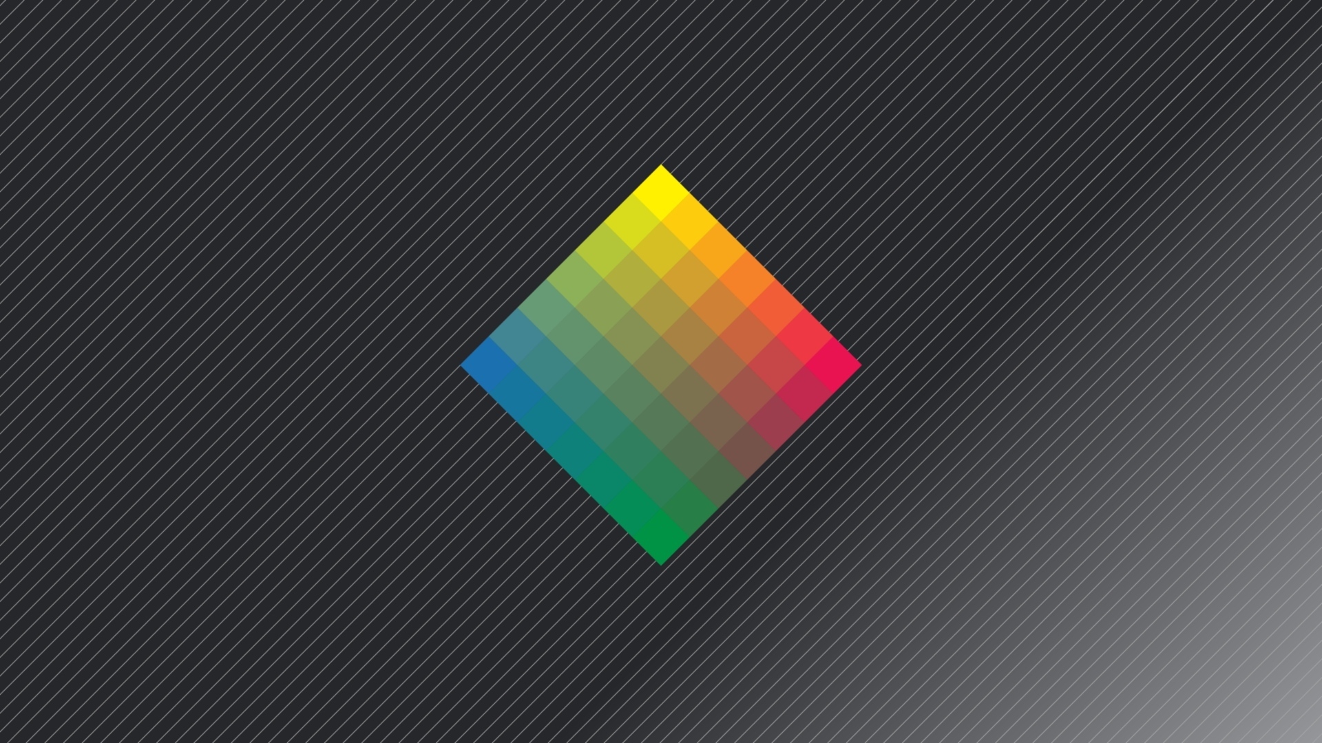 Разноцветный ромб на сером фоне