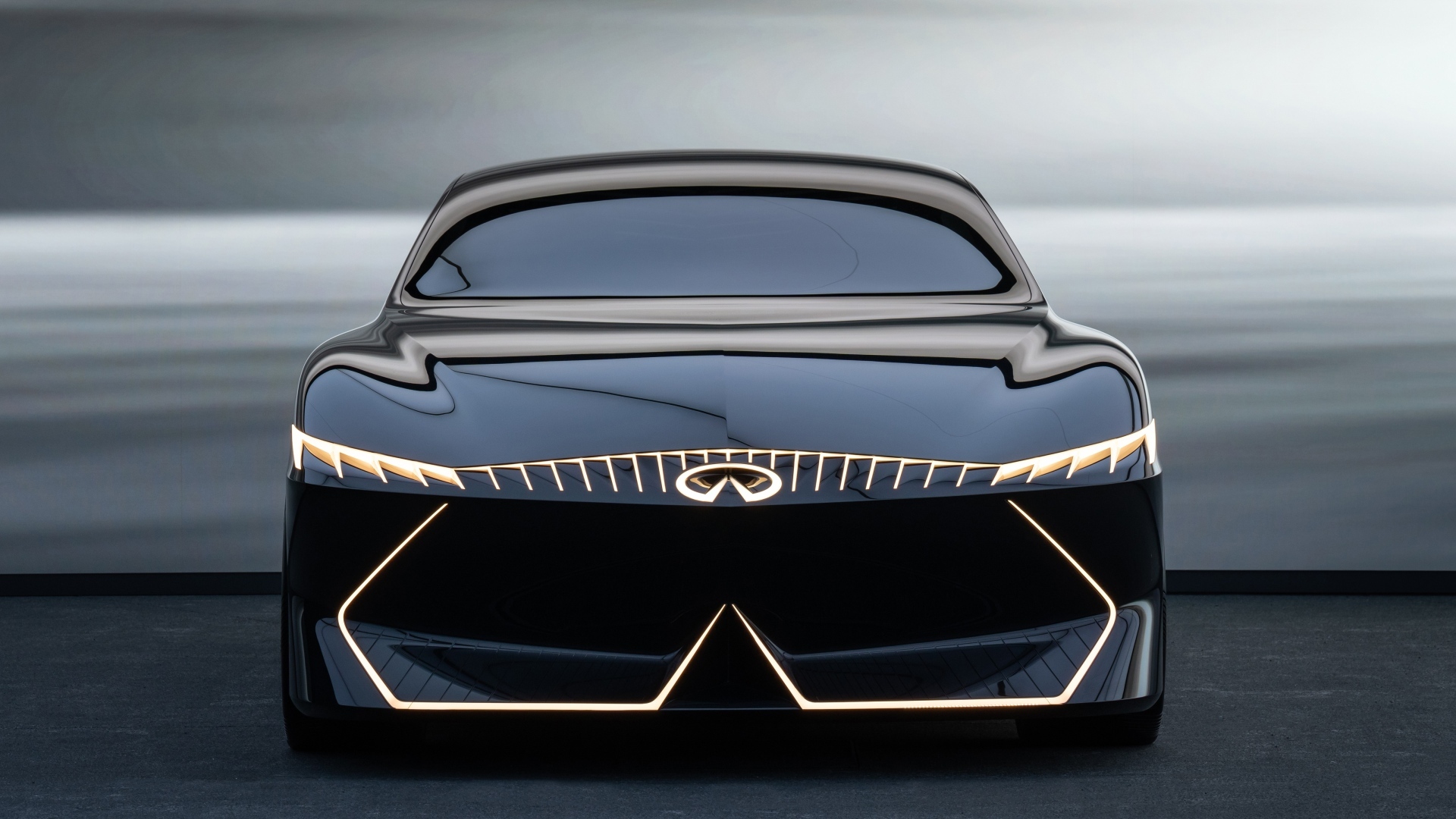 Красивый вид спереди на автомобиль Infiniti Vision Qe 2023 года