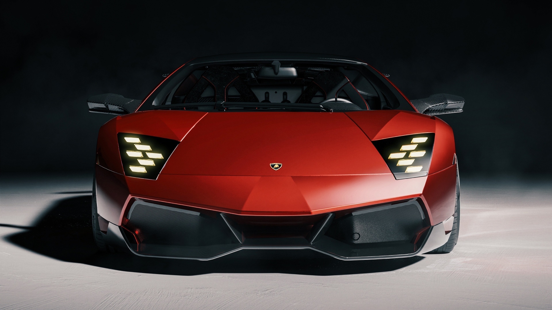 Вид спереди на красный автомобиль  Lamborghini Murcielago