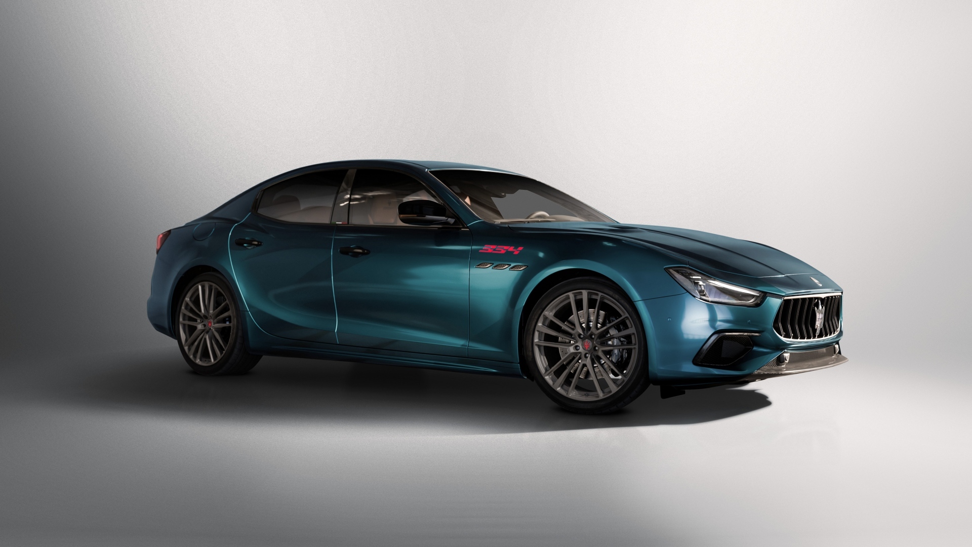 Автомобиль Maserati Ghibli 334 Ultima 2023 года на сером фоне
