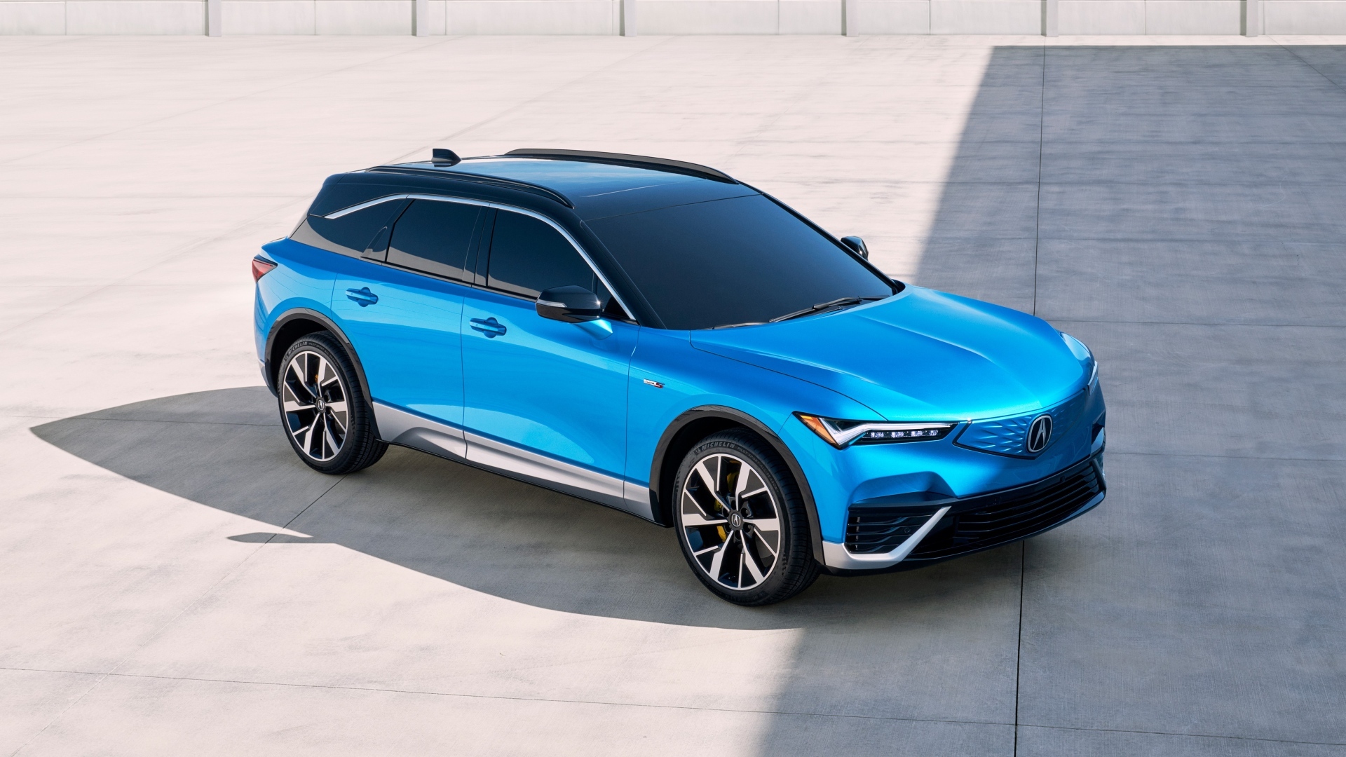 Голубой автомобиль Acura ZDX Type S 2024 года