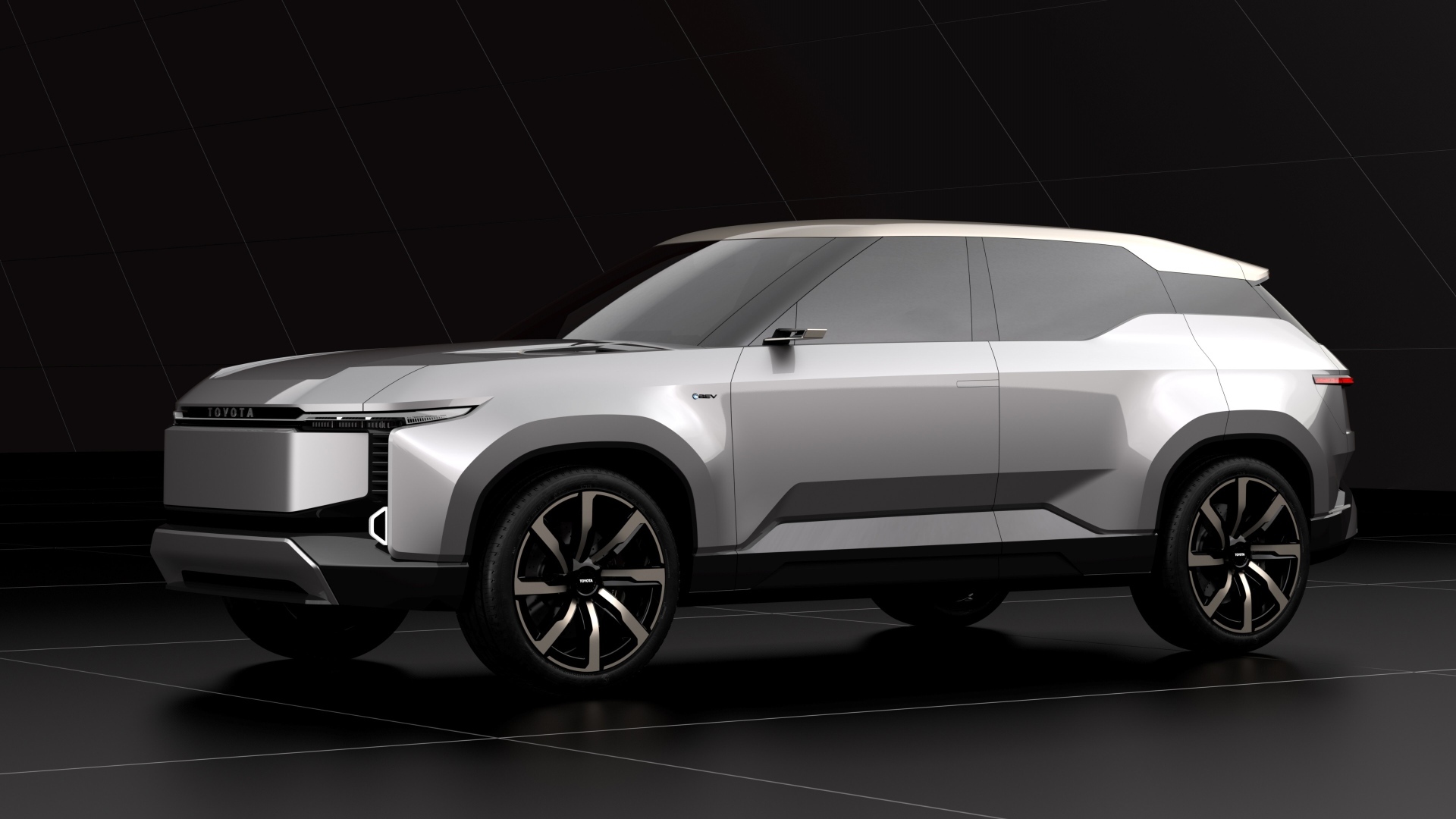 Серебристый внедорожник Toyota Land Cruiser Se на черном фоне