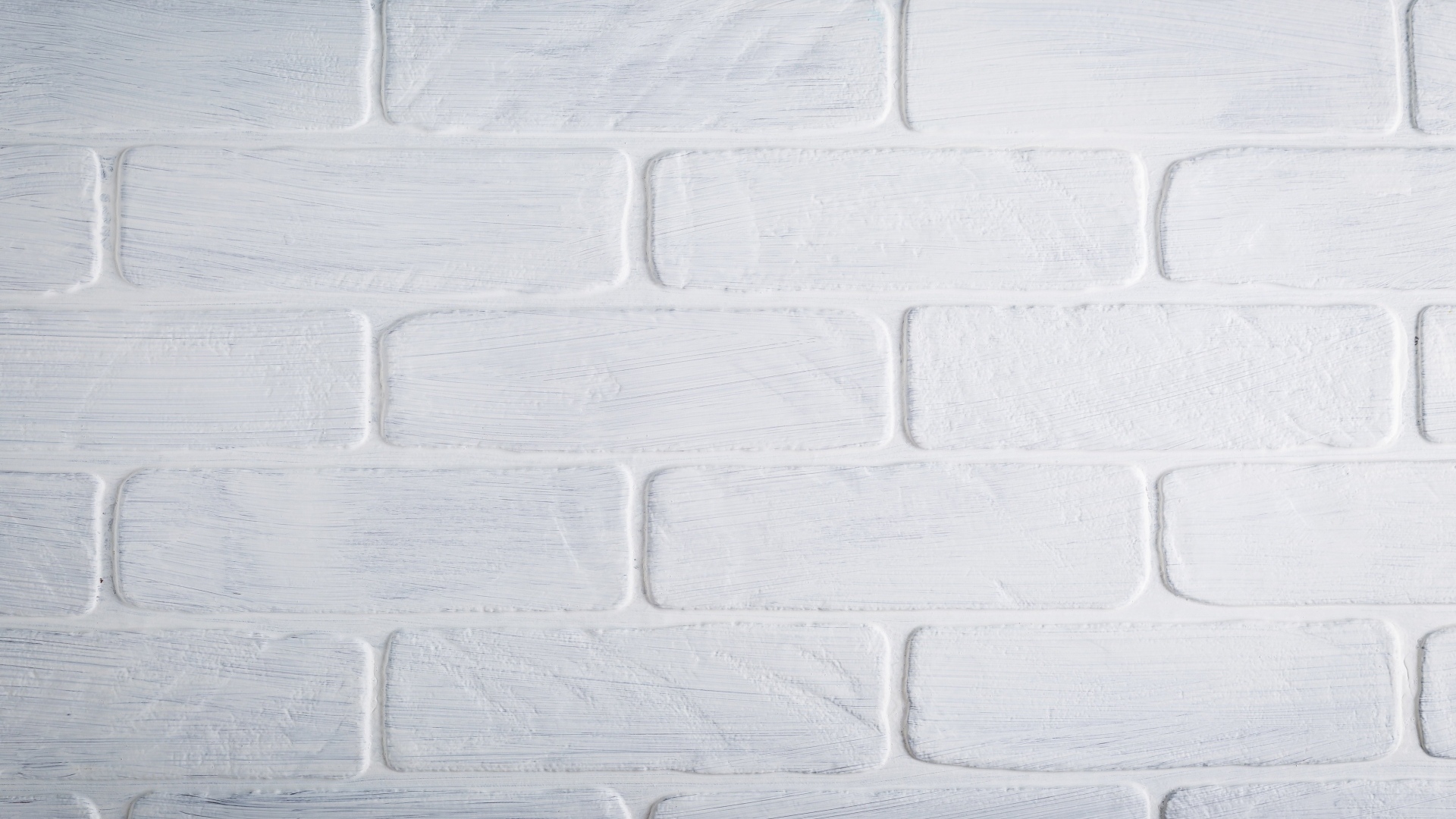 Белая кирпичная стена крупным планом