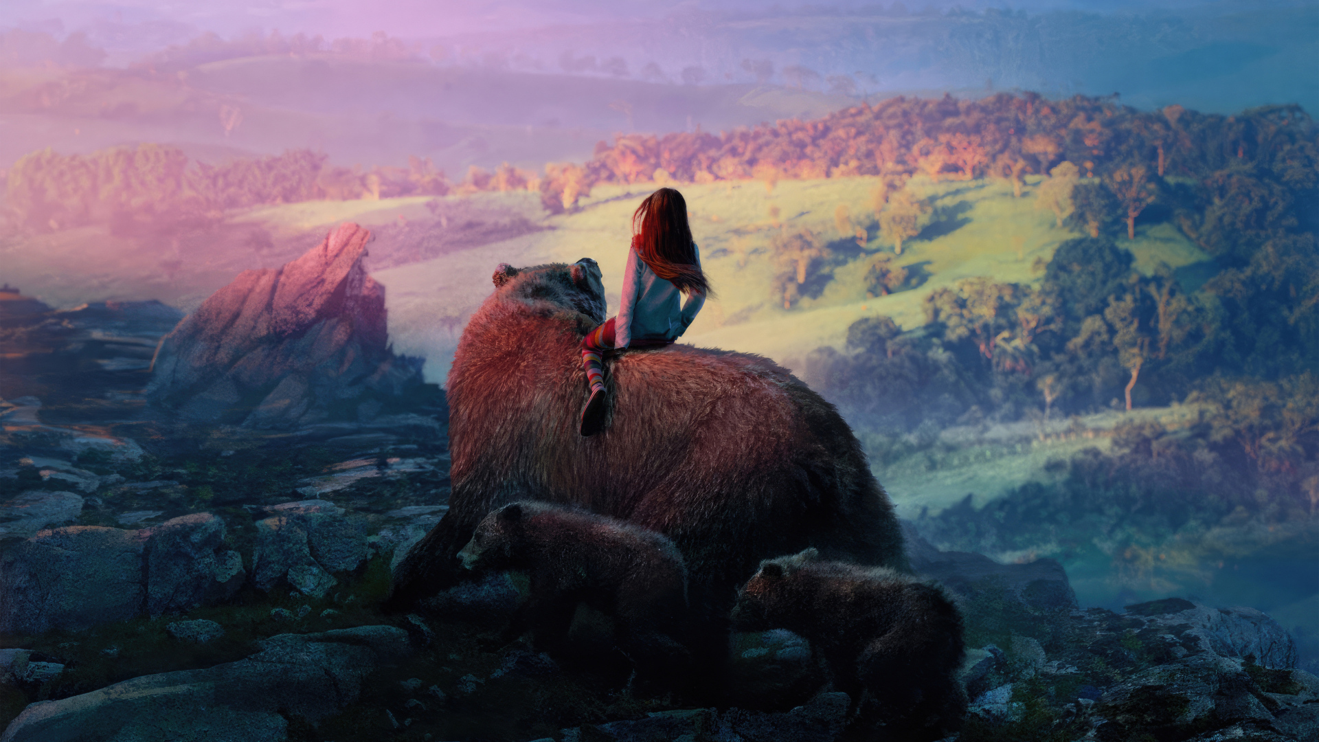 Девочка катается на большом медведе