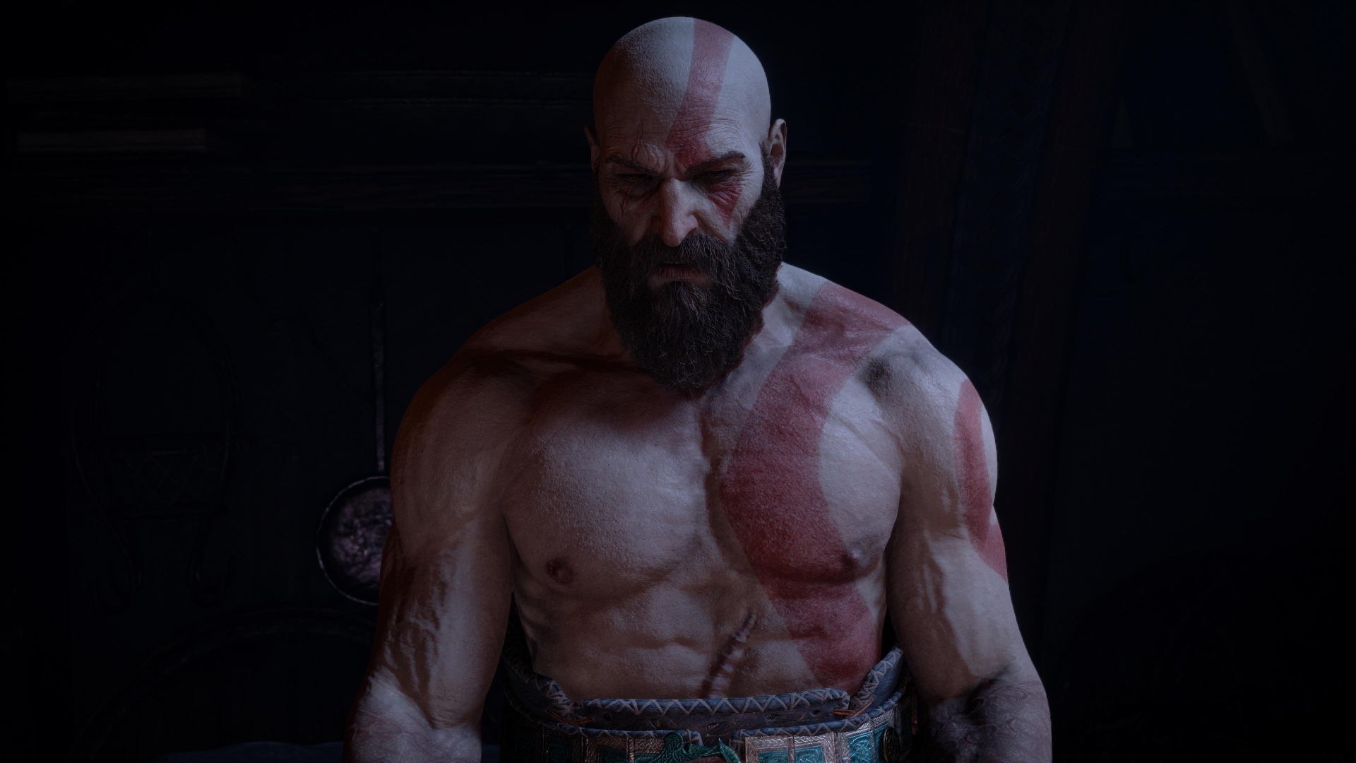 Накаченный мужчина Кратос персонаж компьютерной игры God of war
