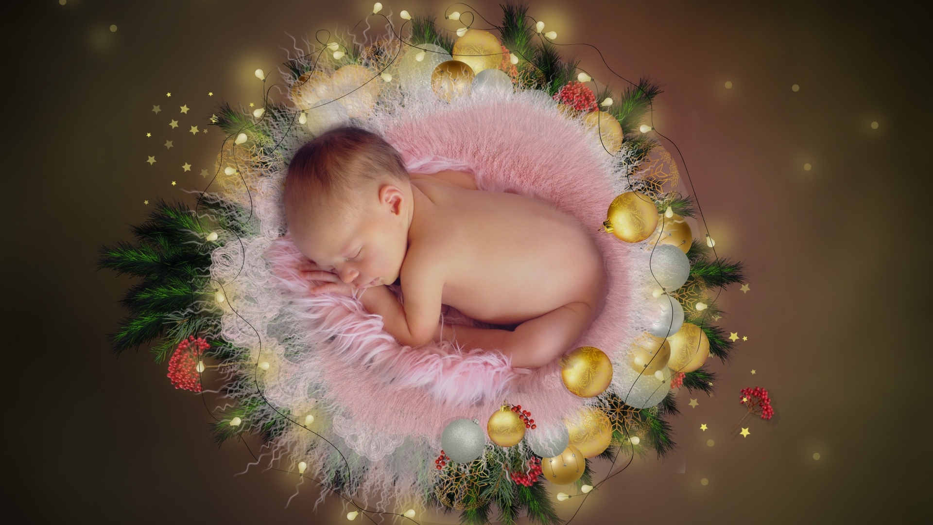 Маленький новорожденный малыш с гирляндой