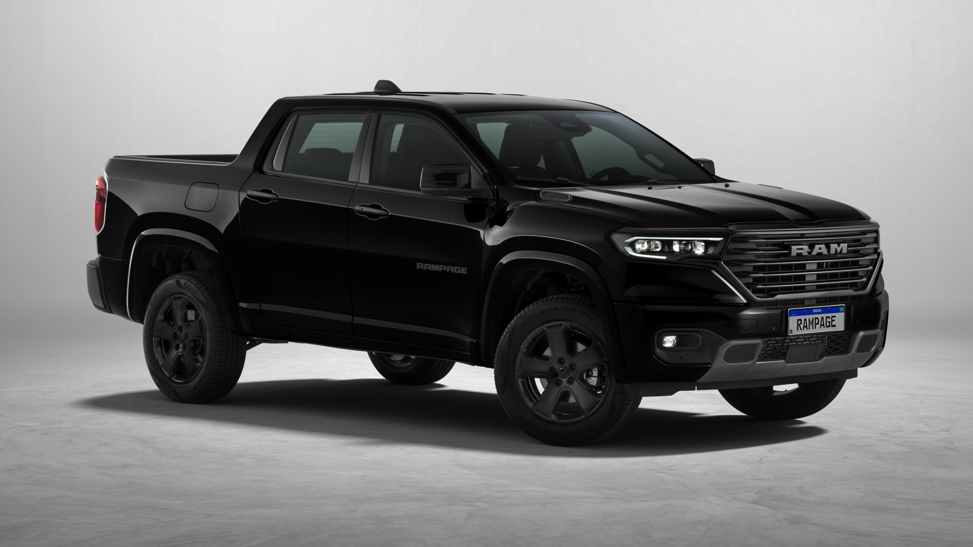 Большой автомобиль Ram Rampage Laramie Night Edition 2024 года