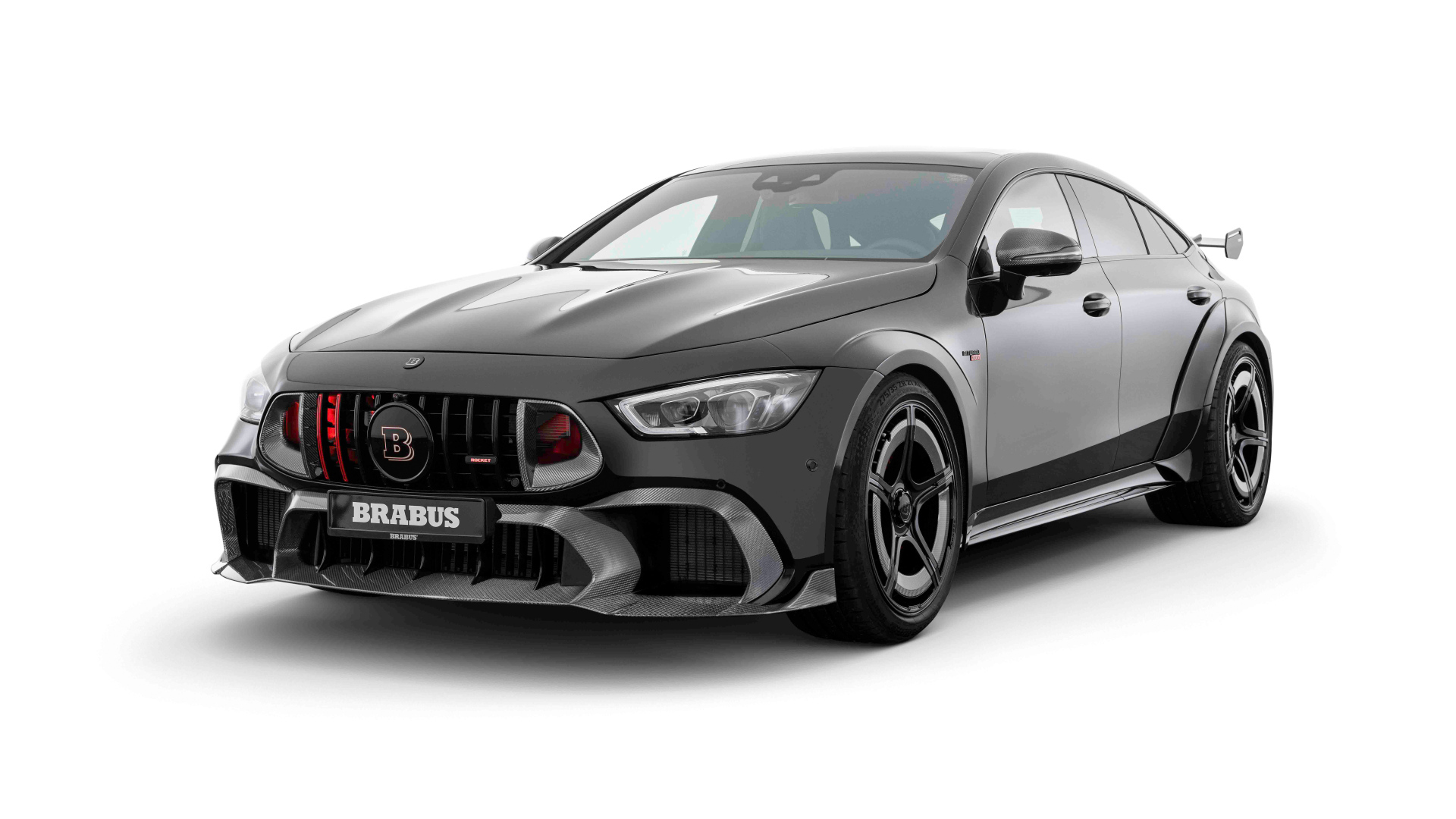 Серый автомобиль Brabus Rocket 1000 2024 года на белом фоне