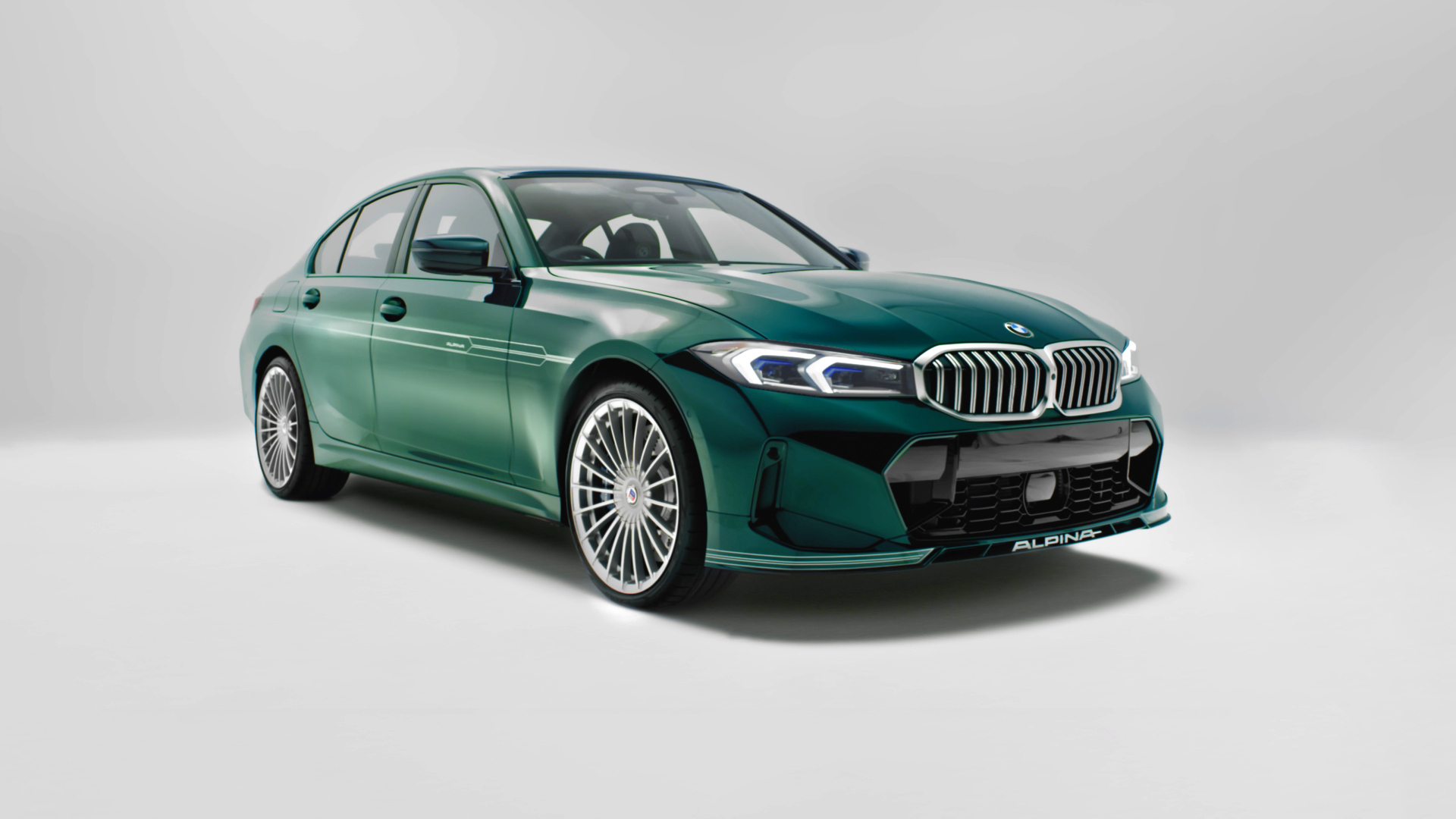 Зеленый автомобиль Alpina B3 50 Years Of BMW