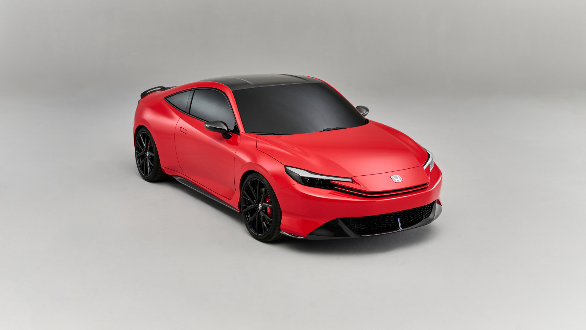 Красный автомобиль Honda Prelude Concept 2024 года на сером фоне