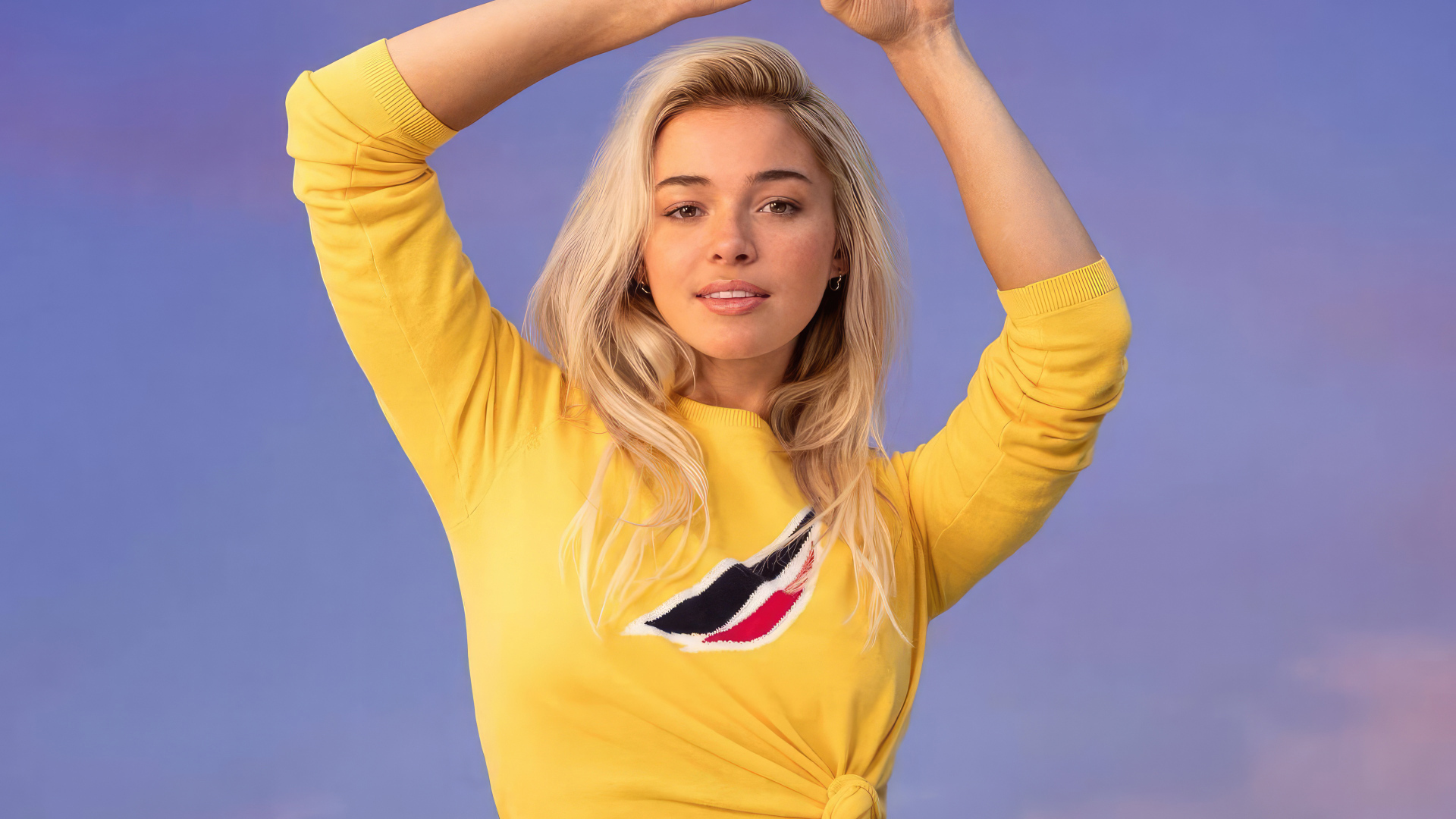 Гимнастка Ливви Данн на сиреневом фоне