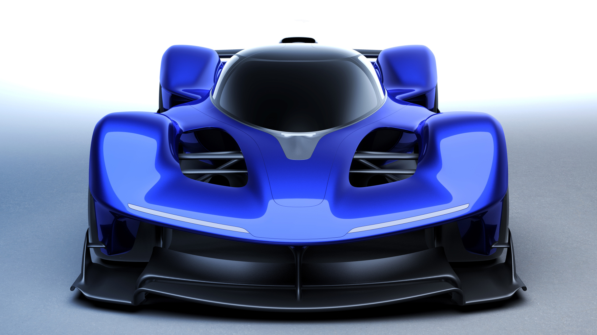 Вид спереди на синий спортивный автомобиль Red Bull RB17 Prototype 2024 года