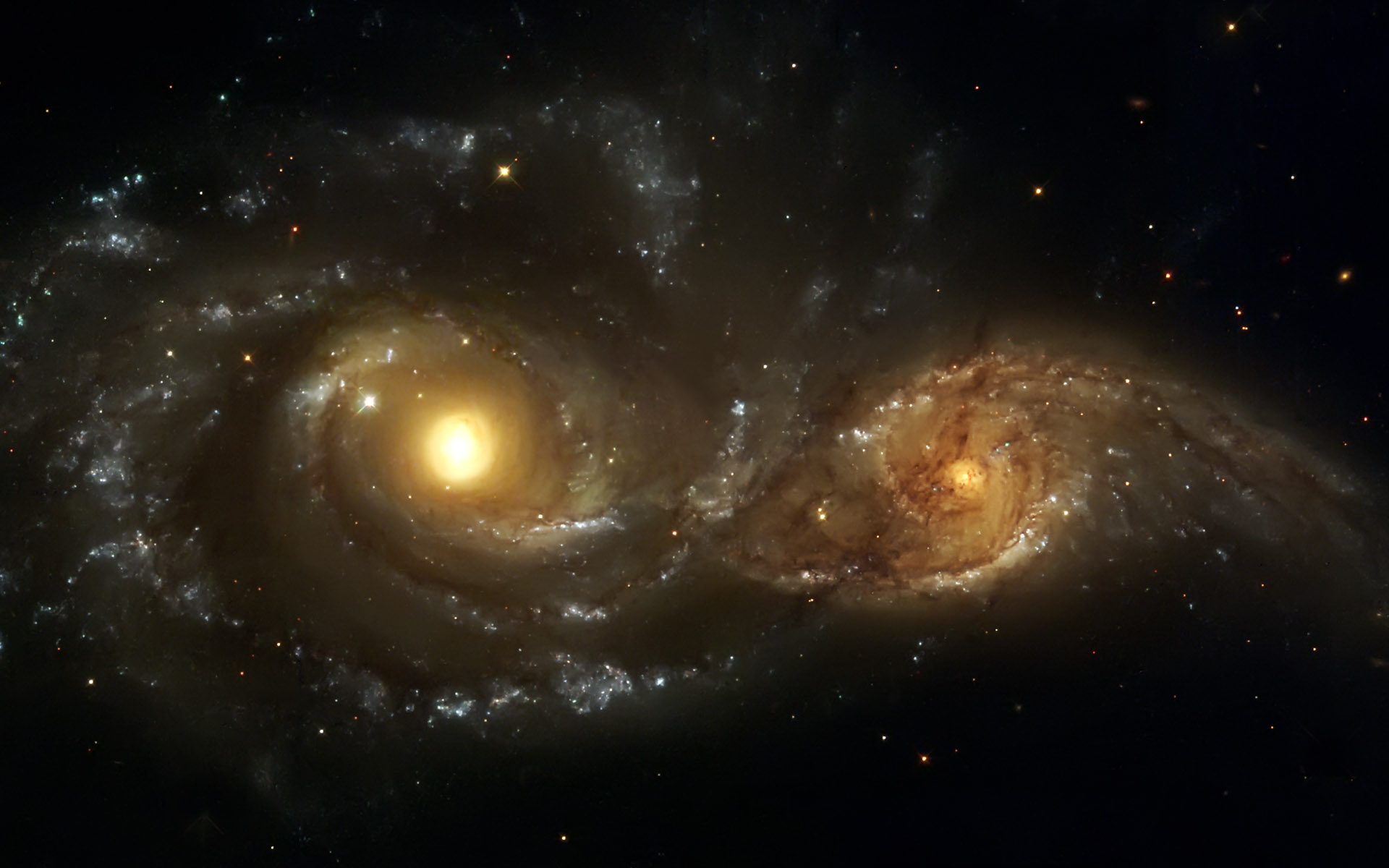 2 звезды в космосе. NGC 2207 И ic 2163. Спиральные Галактики NGC 2207 И ic 2163. Галактики ic 2207. Галактика Млечный путь телескоп Хаббл.