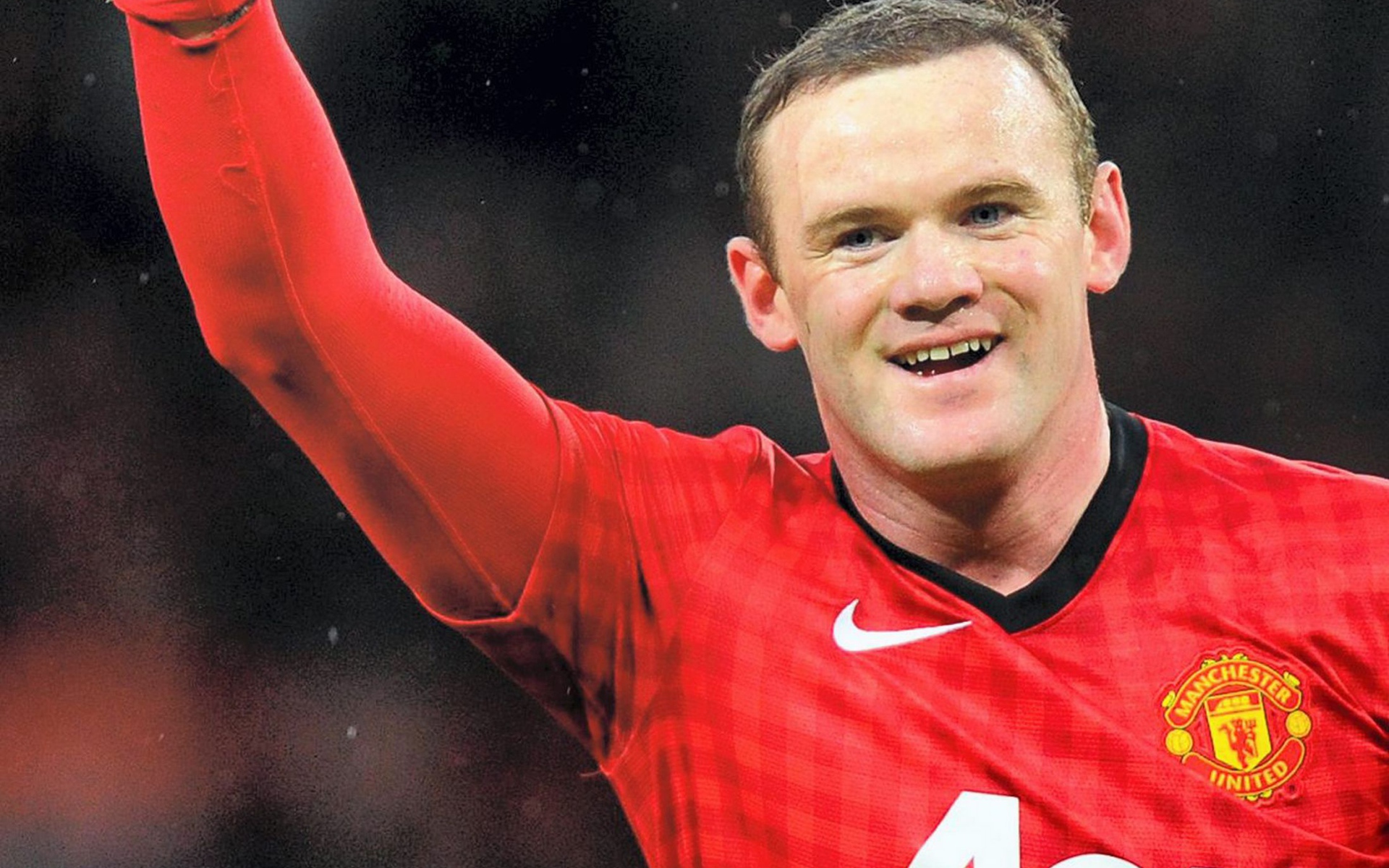 The forward of Manchester United Wayne Rooney on the field