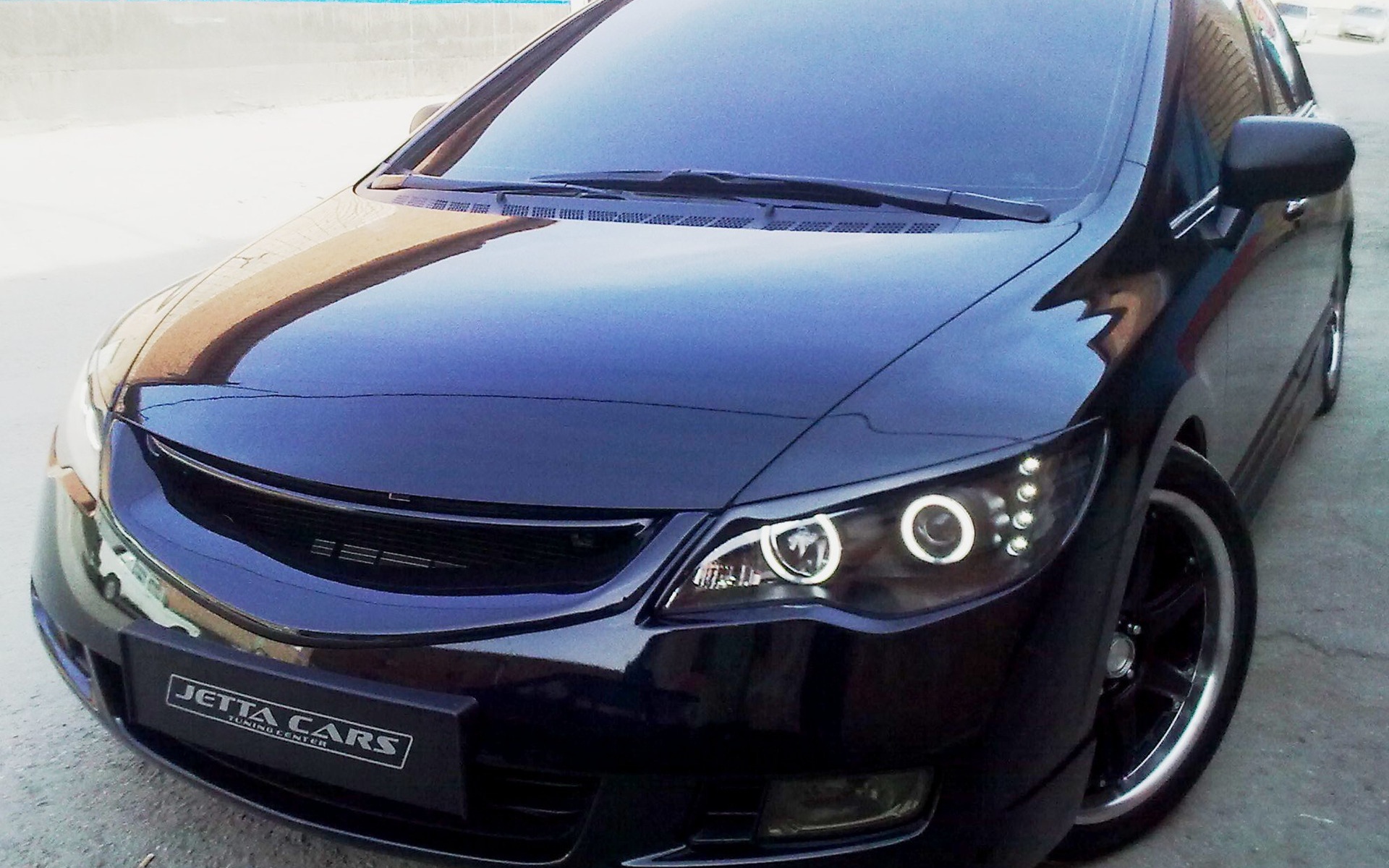 Фото автомобиля Honda Civic 4D