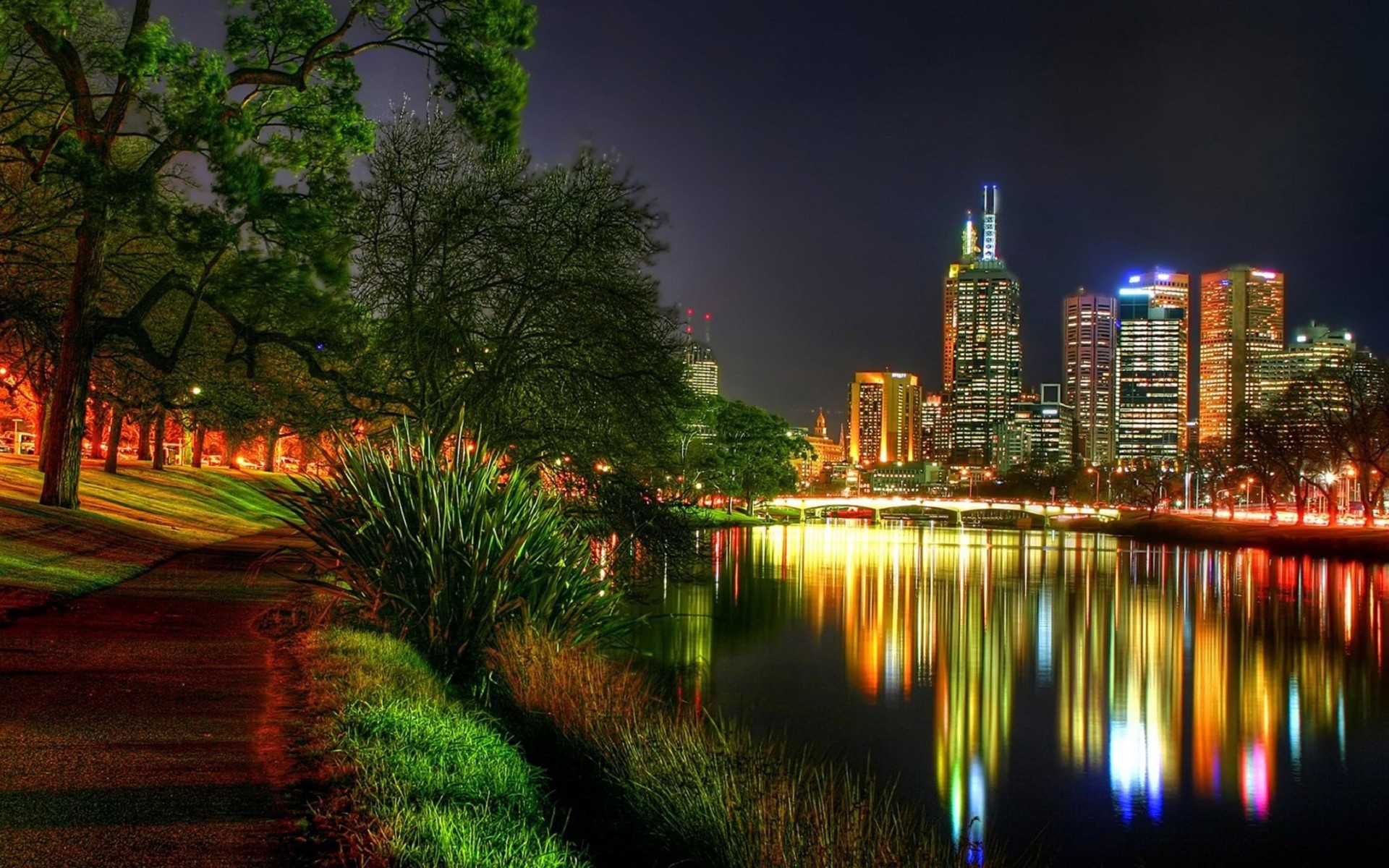 	   The lights of the city reflected in the river