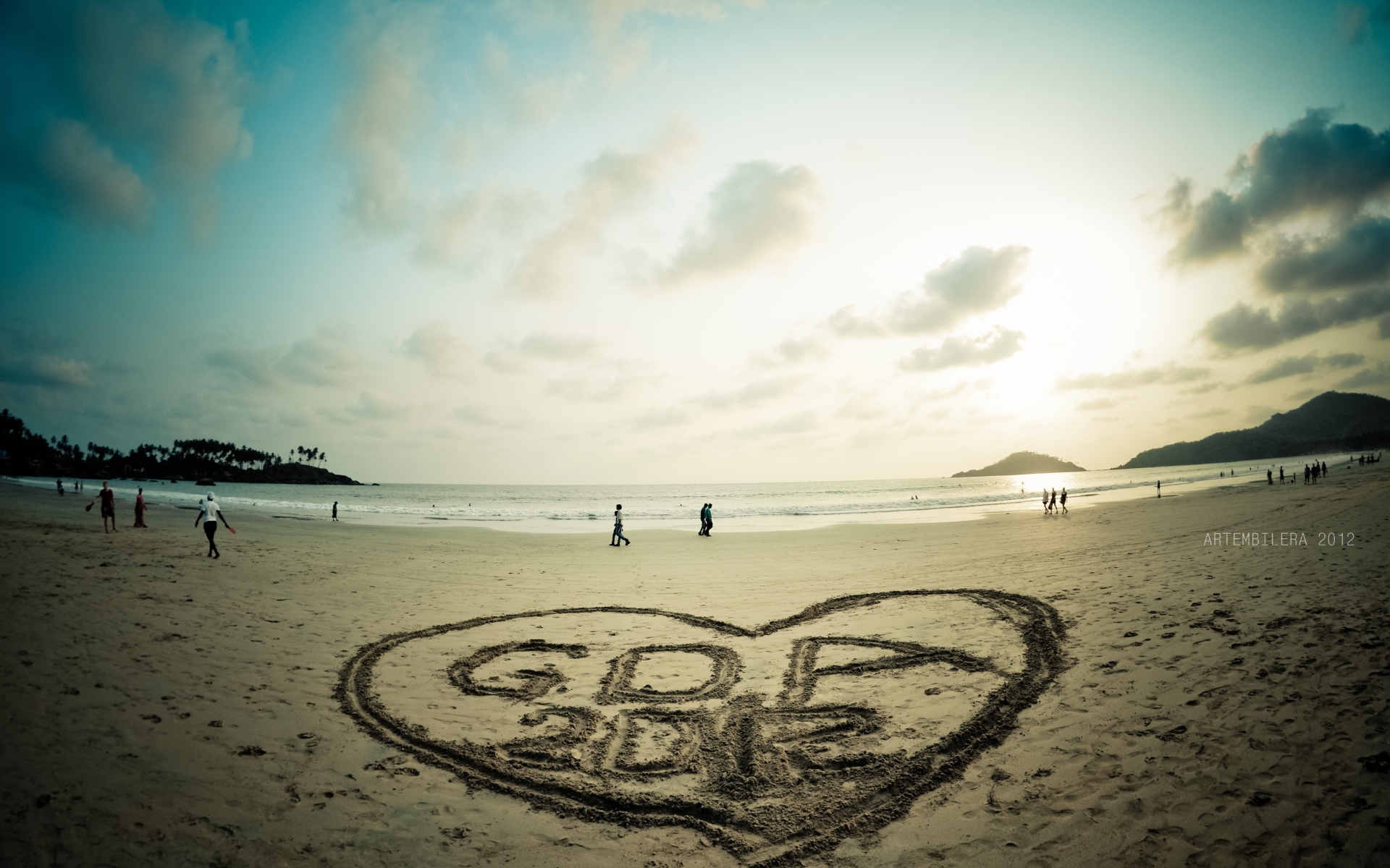 Drawing on the sand in Goa