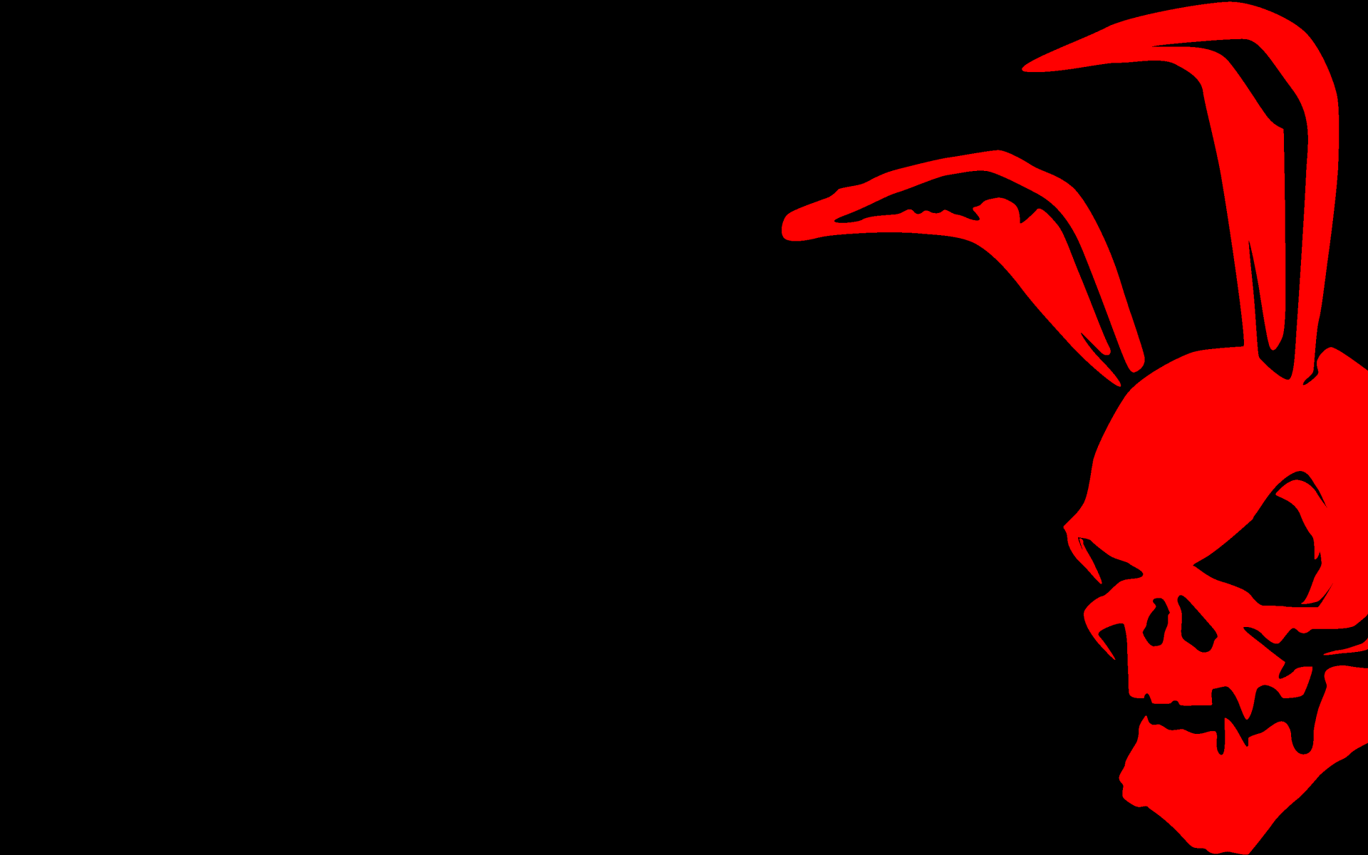 Красный череп с заячьими ушами на черном фоне