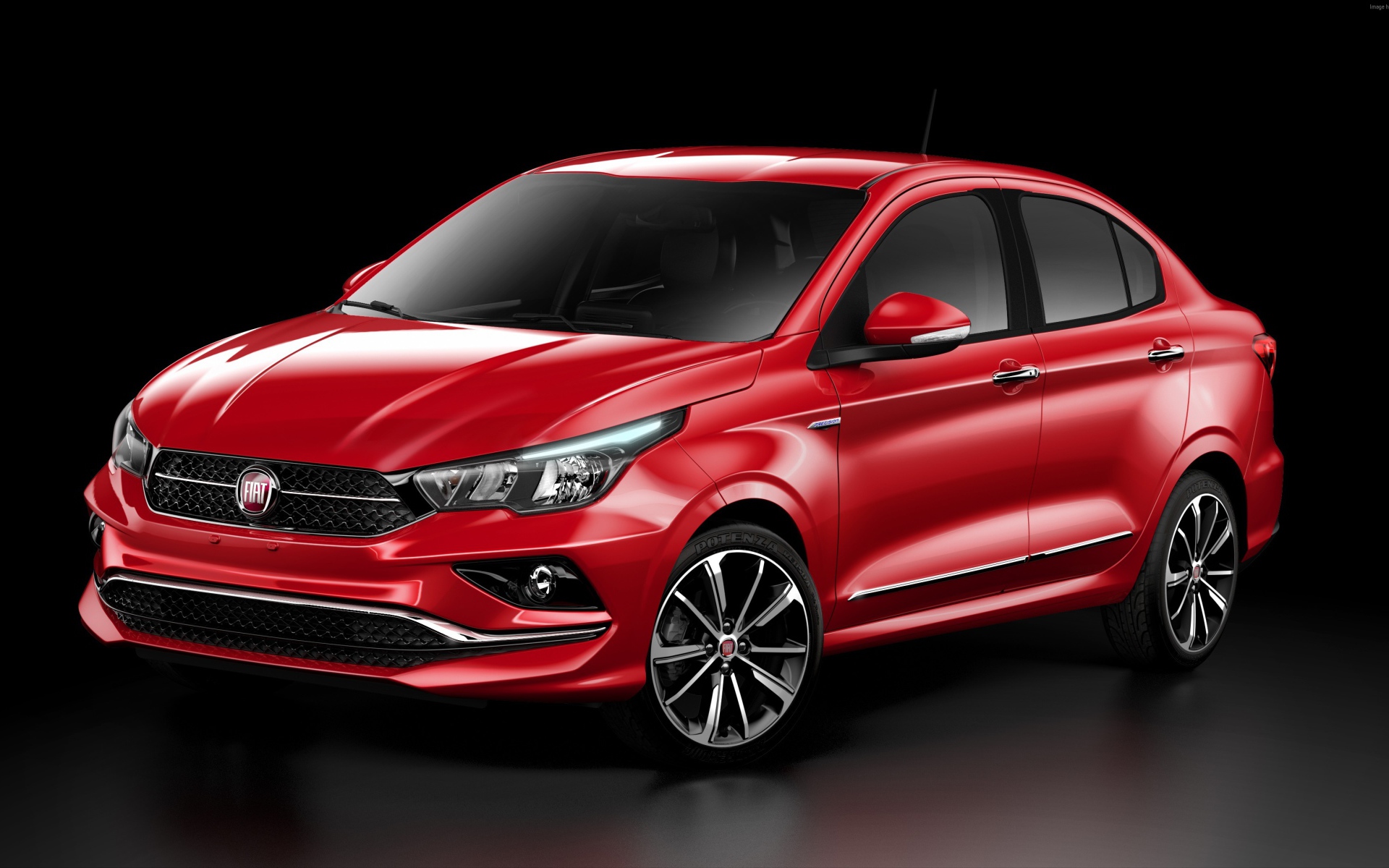 Красный автомобиль  Fiat Cronos, 2018 на черном фоне