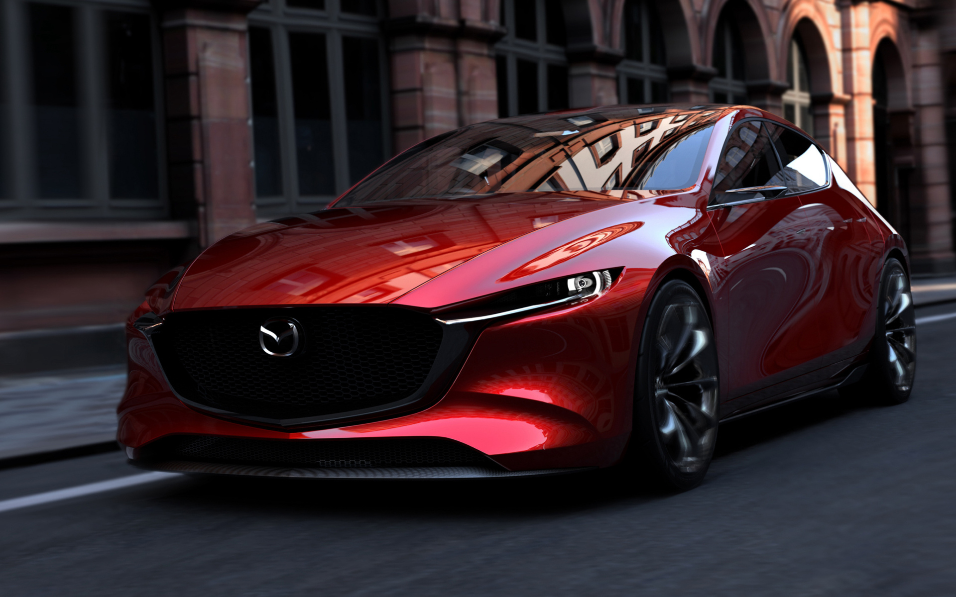 Красный автомобиль Mazda Kai на улицах города