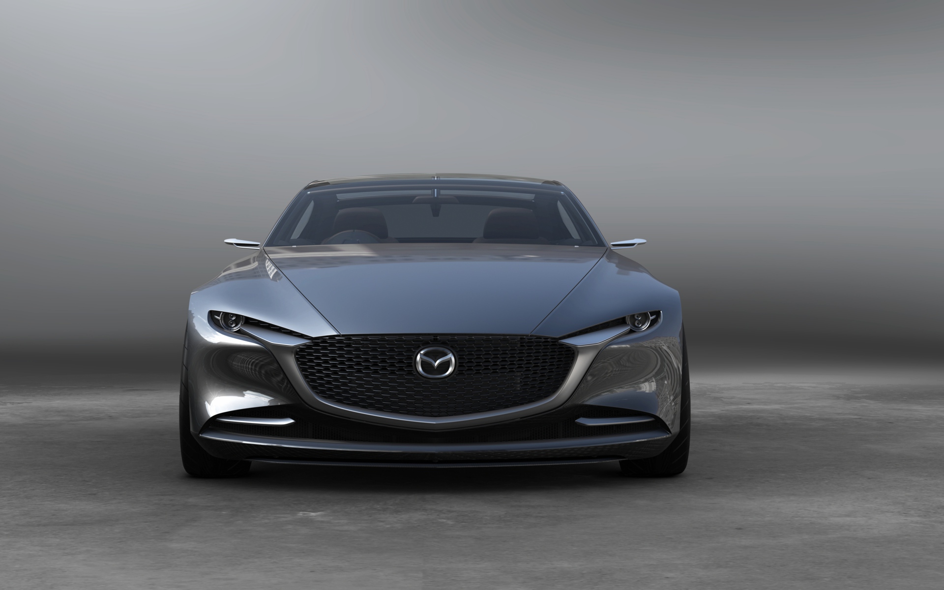 Серебристый автомобиль  Mazda Vision Coupe, 2017 вид спереди