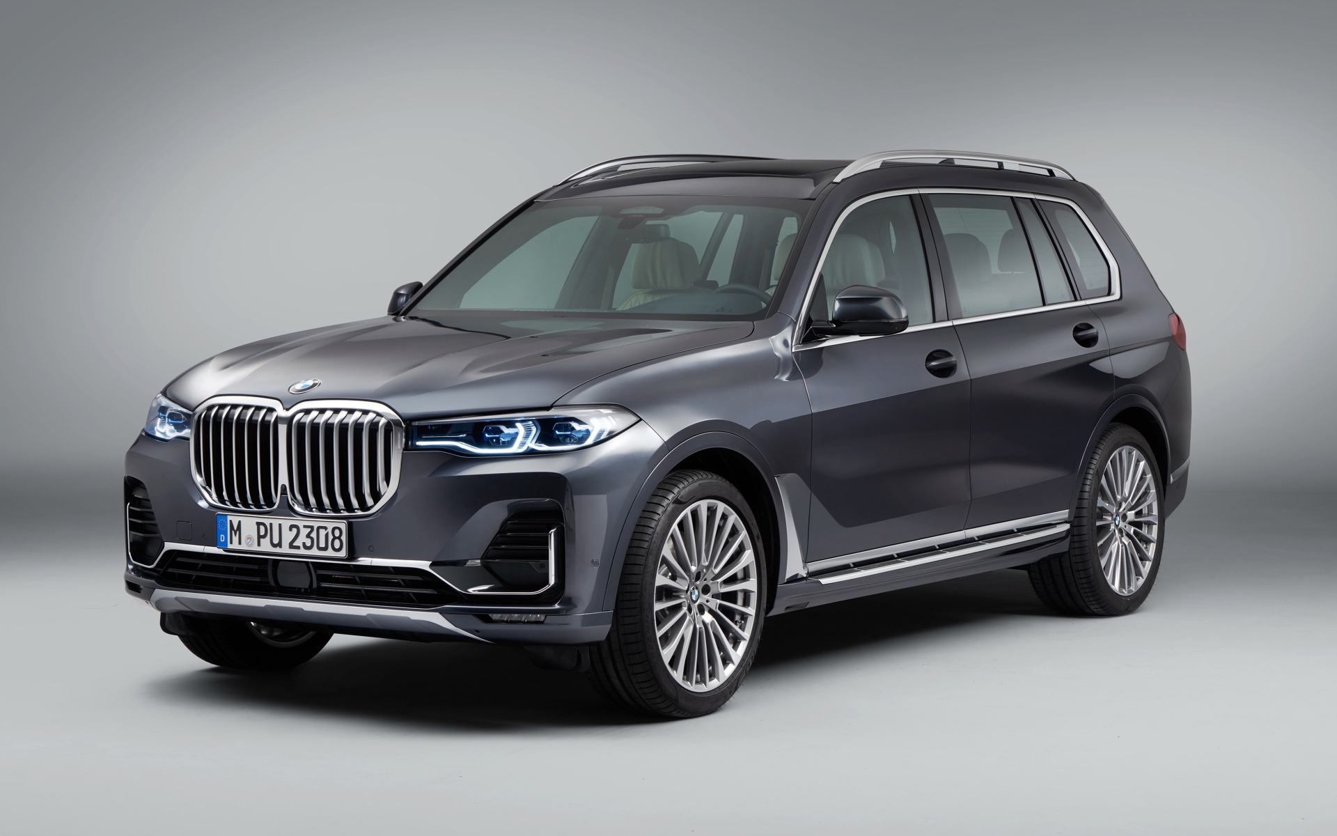 Silver BMW X7 2018 SUV on a gray background