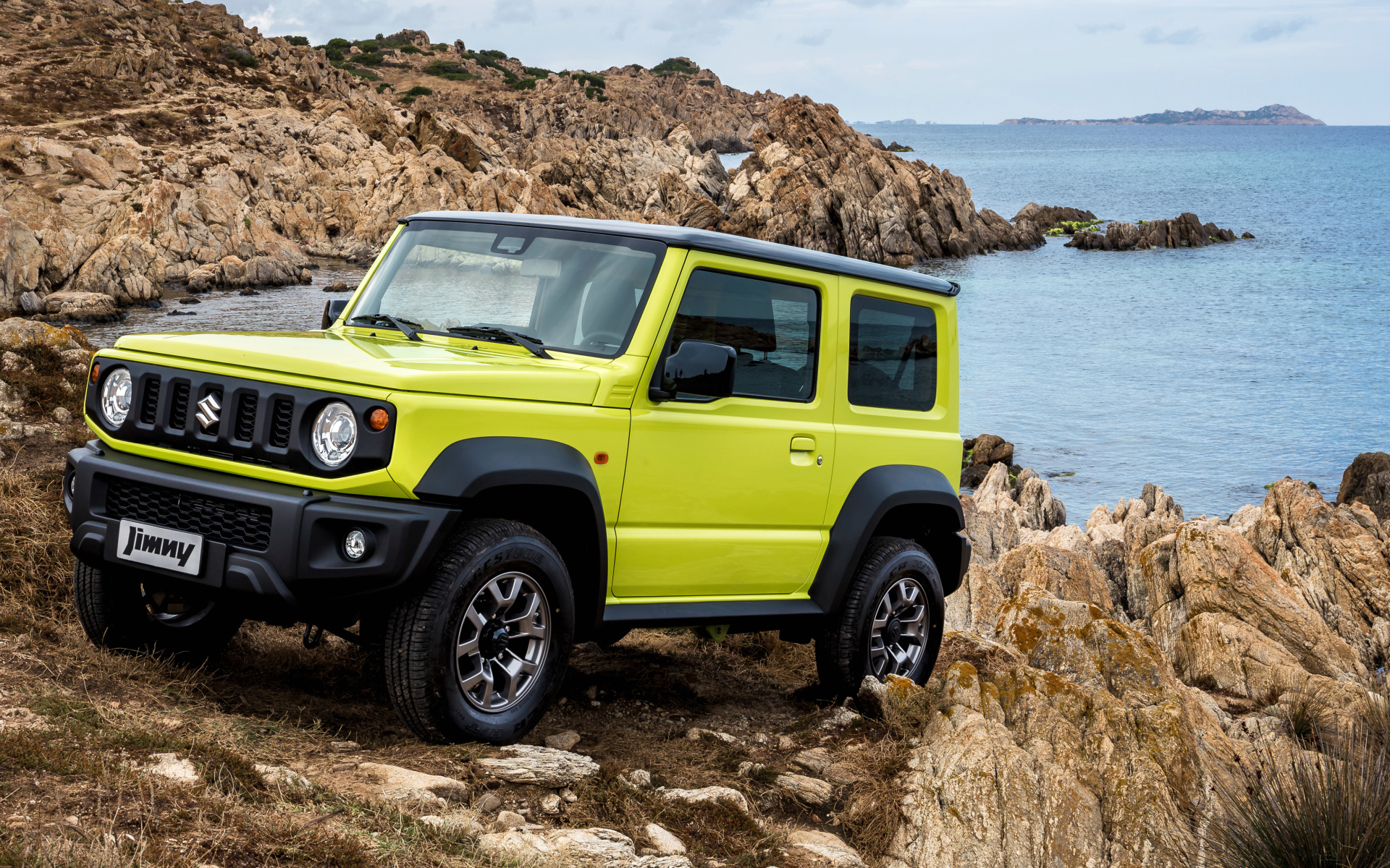 Желтый внедорожник Suzuki Jimny AllGrip 2018 года