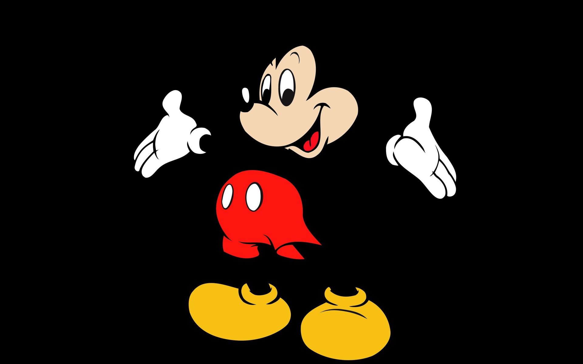 Популярный герой мультфильмов Микки Маус на черном фоне