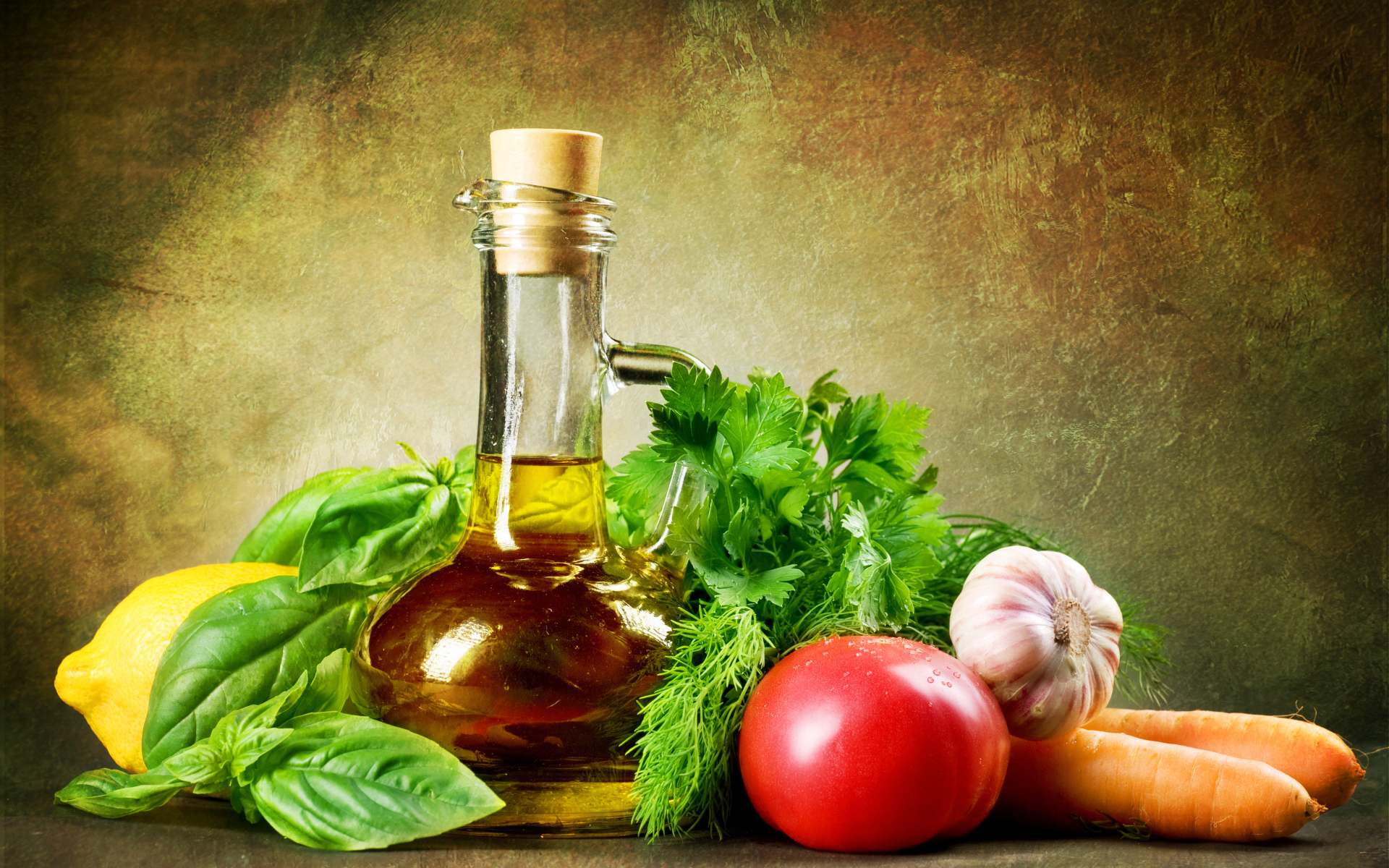 Овощи на столе с  кувшином растительного масла