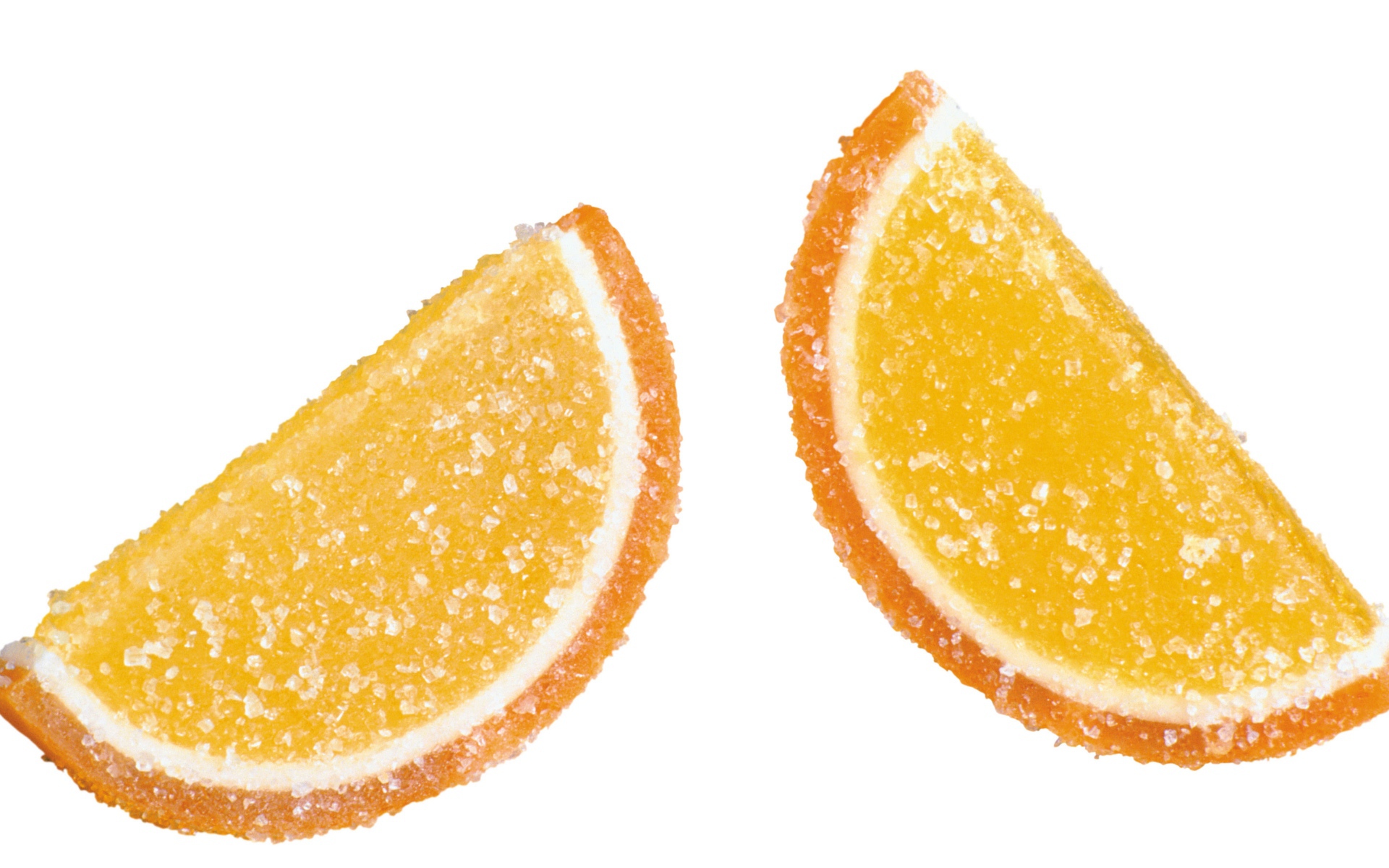 Две конфеты желе в сахаре на белом фоне