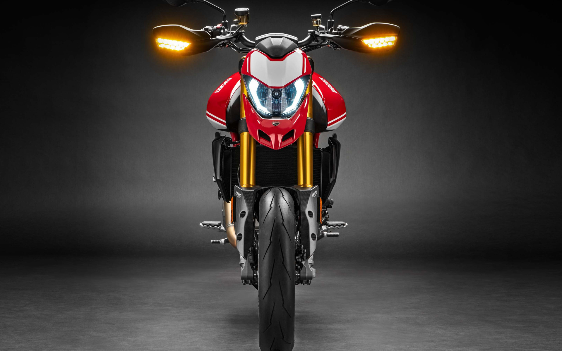 Motorcycle Ducati Hypermotard 950 SP, 2019 on a gray background front view