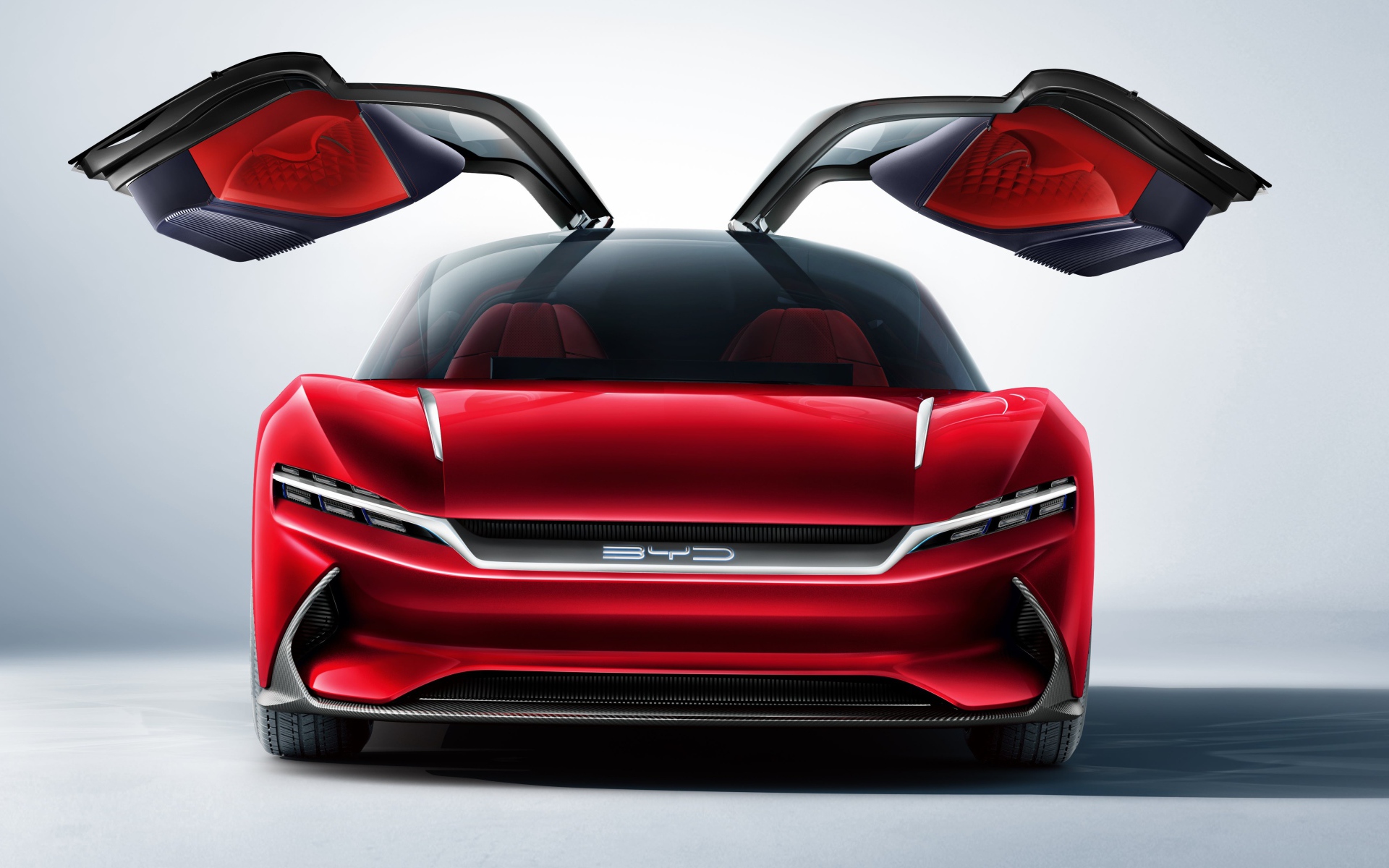 Красный автомобиль BYD E-SEED GT 2019 года с открытыми дверями