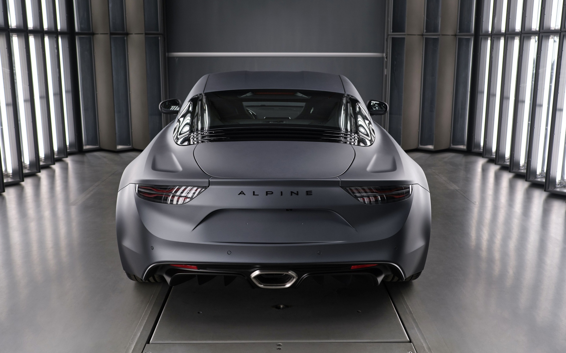 Серебристый автомобиль Alpine A110S, 2019 года вид сзади