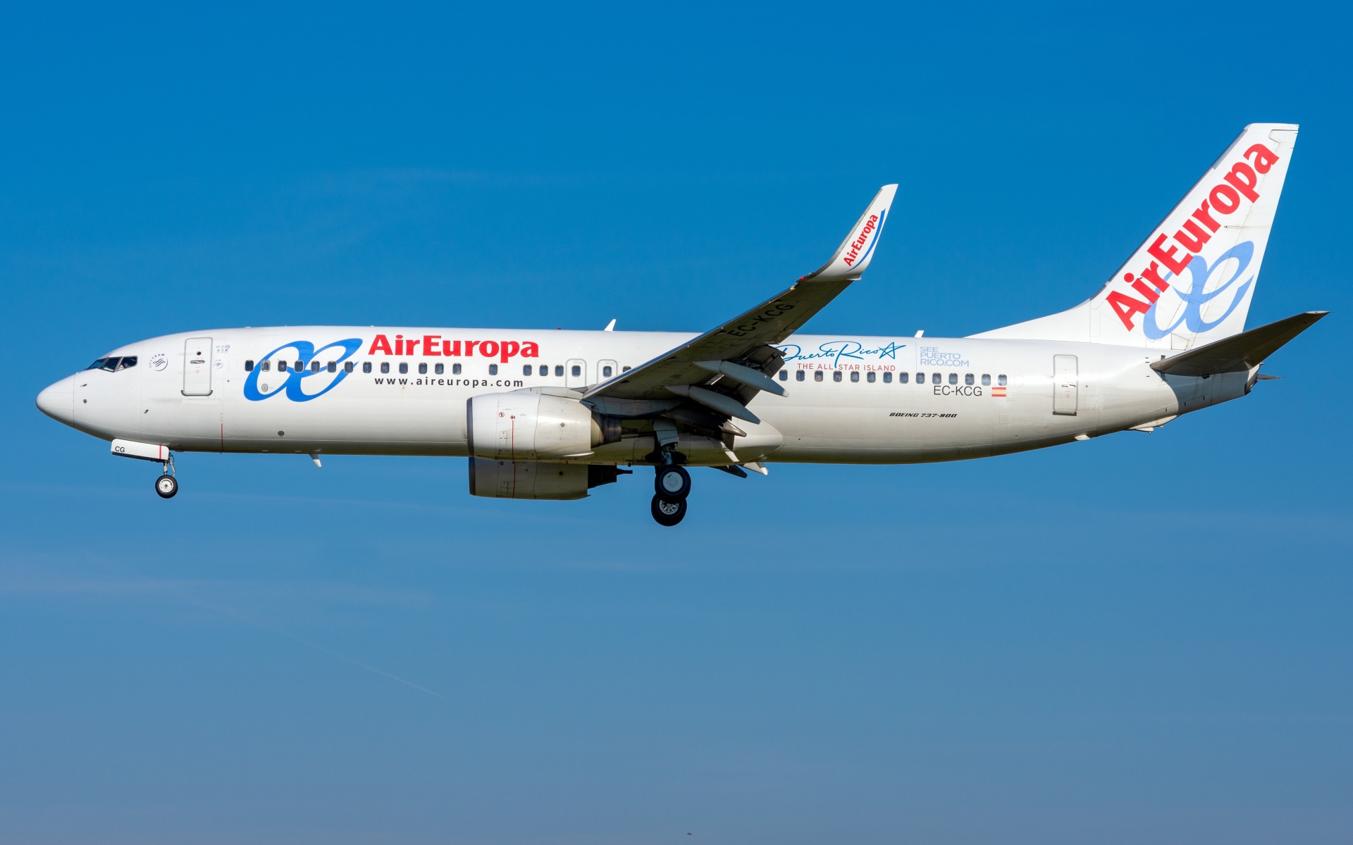 Large passenger Boeing 737-800W airline Air Europa in the blue sky