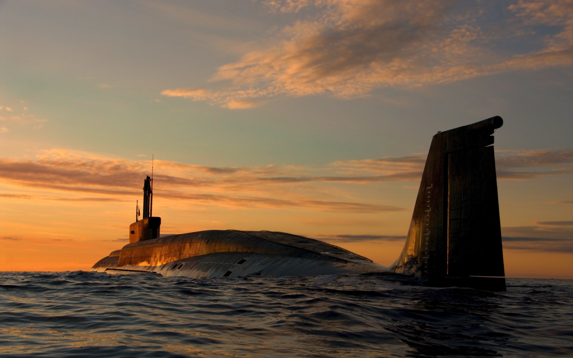 Large submarine in the sea under a beautiful sky