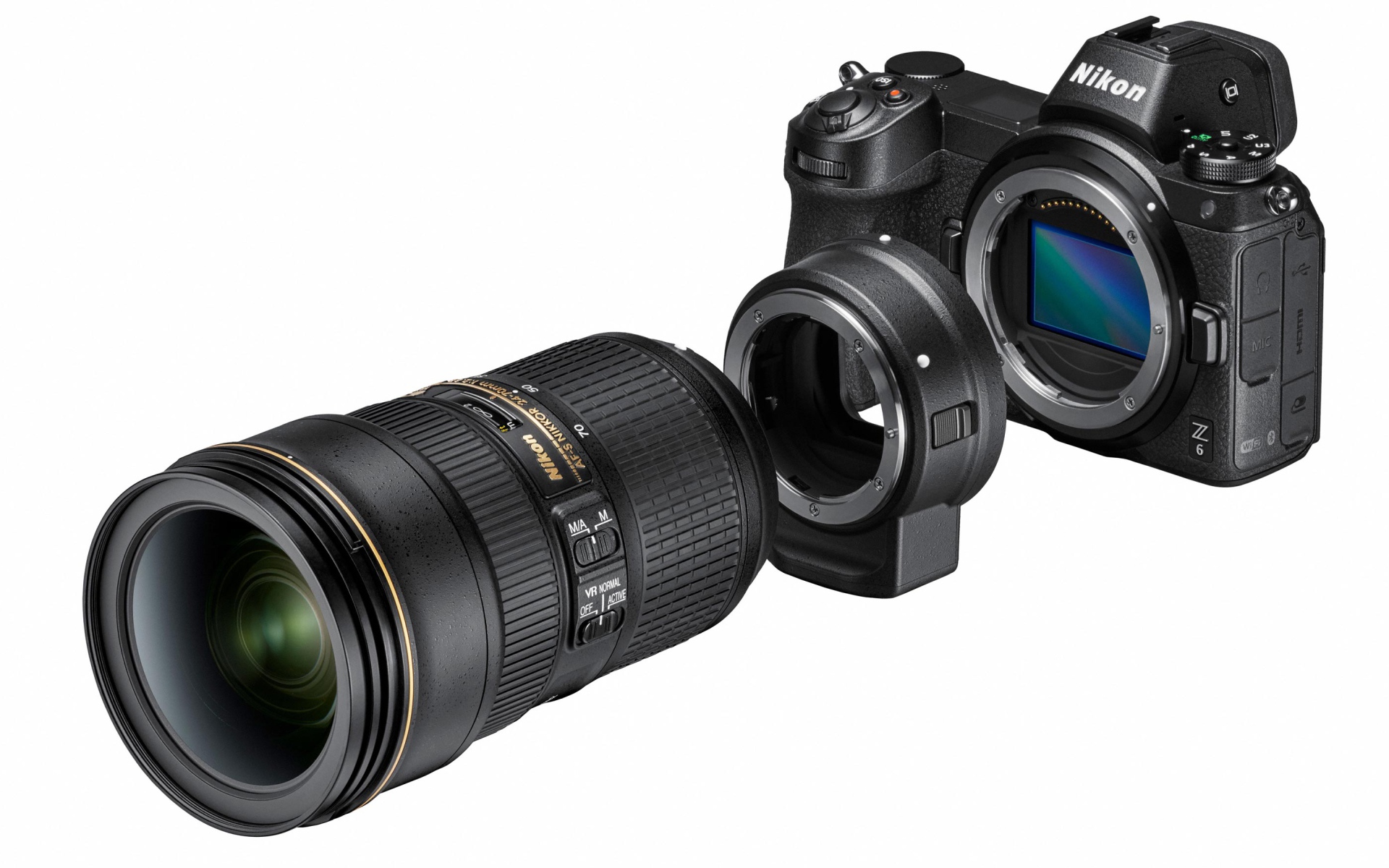 Фотоаппарат Nikon Z7 с объективом на белом фоне