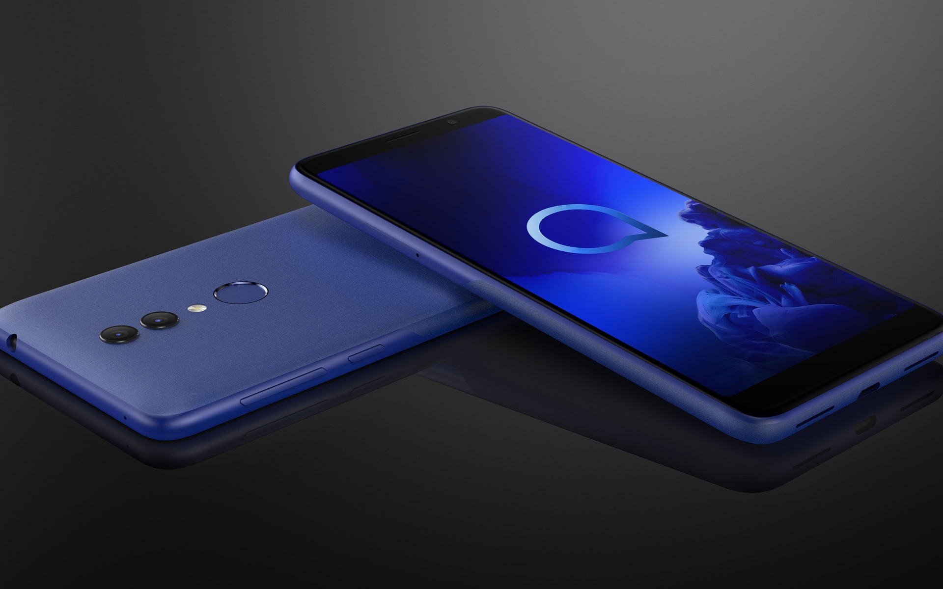 Два тонких смартфона Alcatel 1 на сером фоне