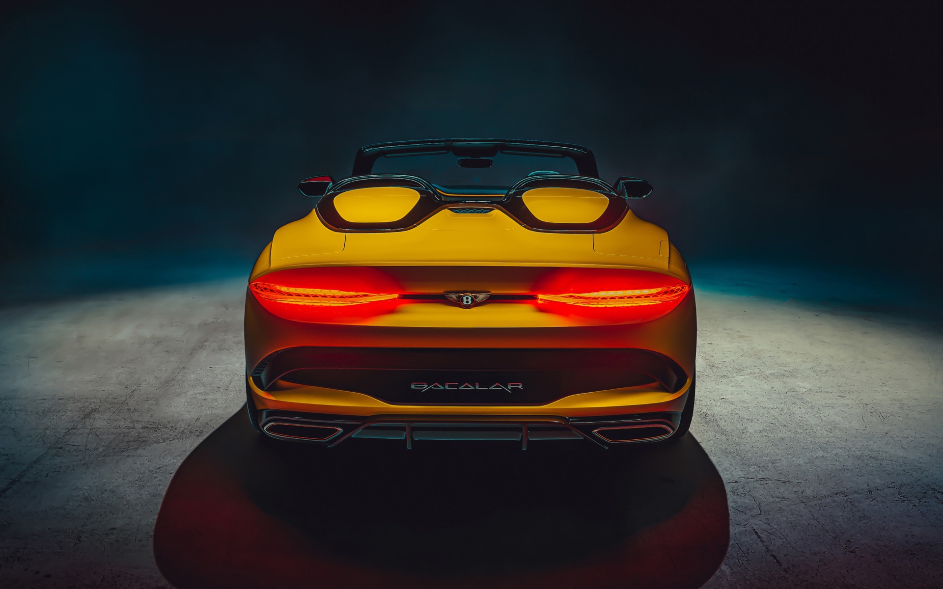 Желтый автомобиль Bentley Mulliner Bacalar 2020 года вид сзади