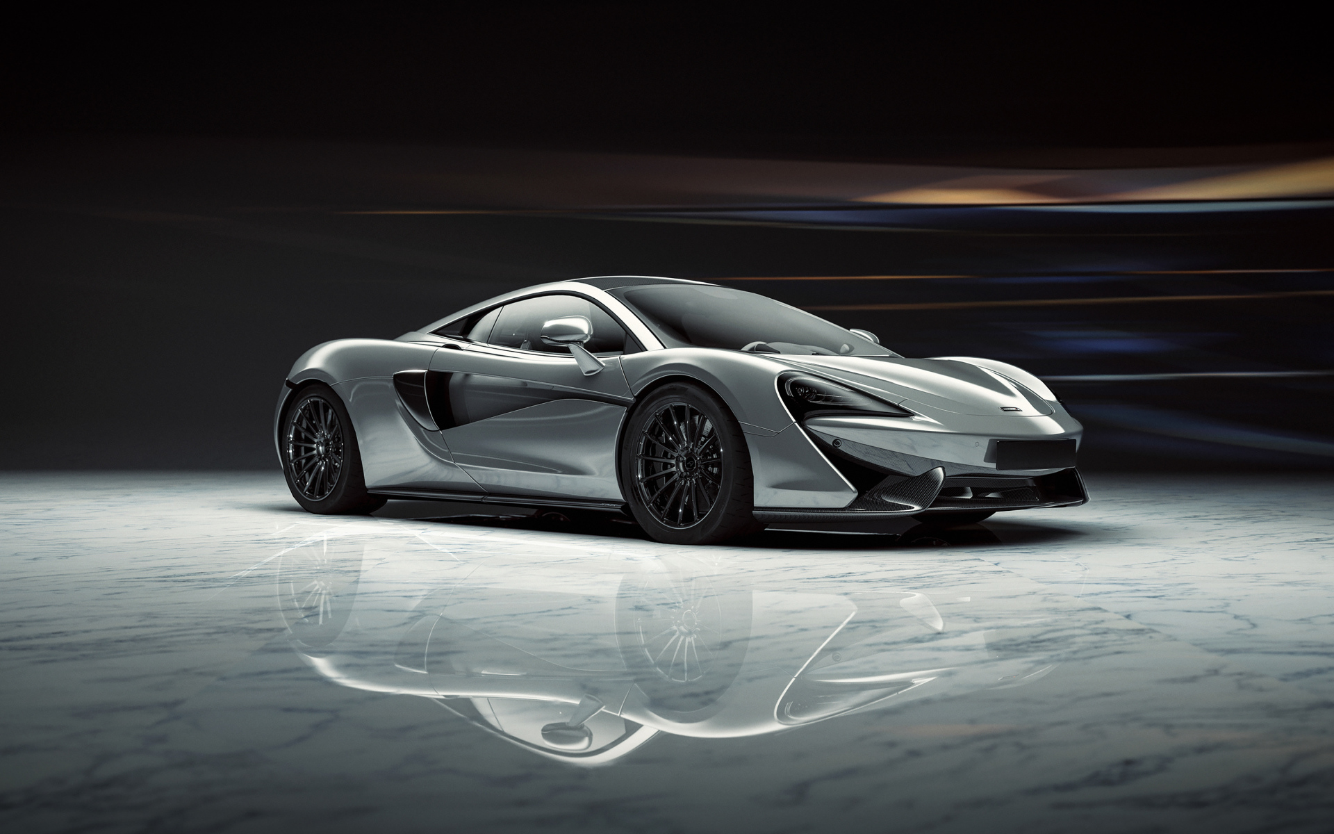 Серый спортивный автомобиль McLaren 520S 