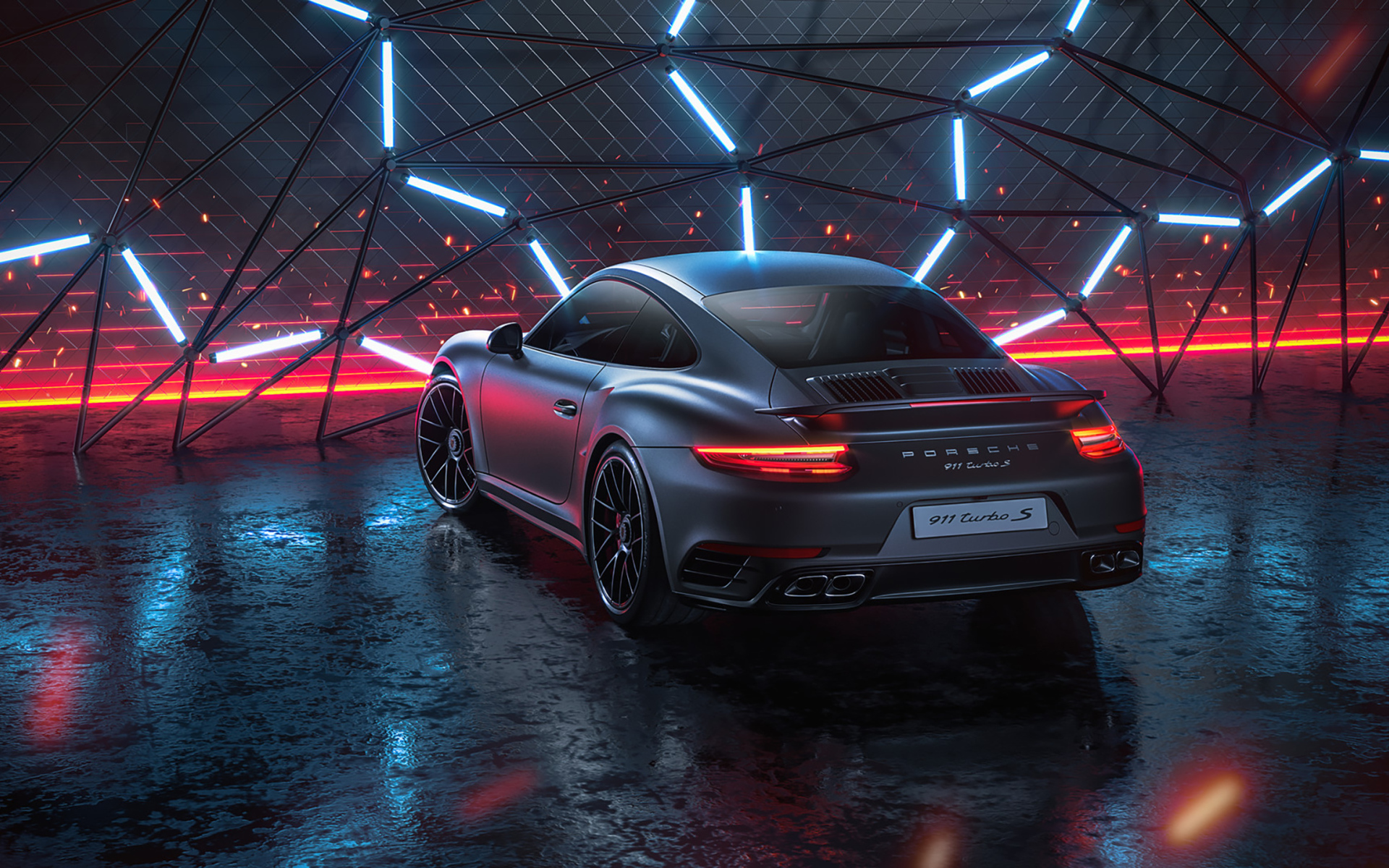 Серебристый автомобиль Porsche 911 Turbo S 