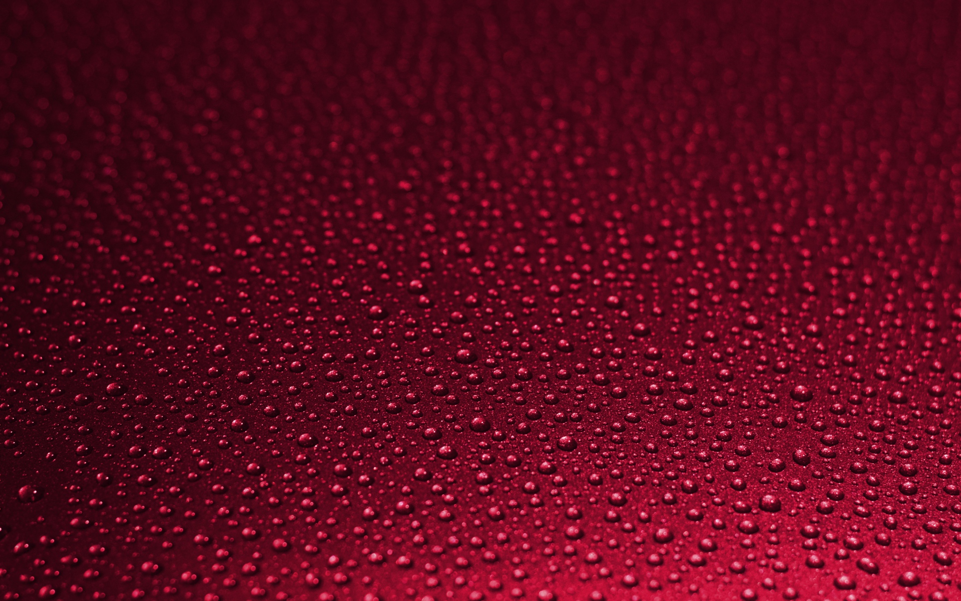 Красный фон с каплями воды 